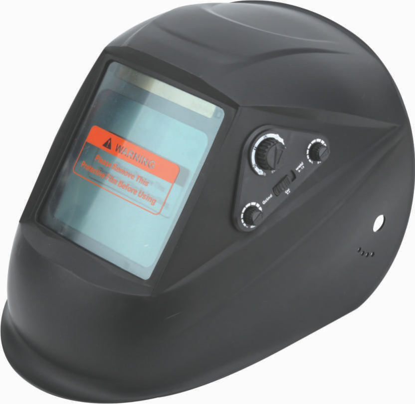 A black welding helmet with a viewing window showing a warning sticker.