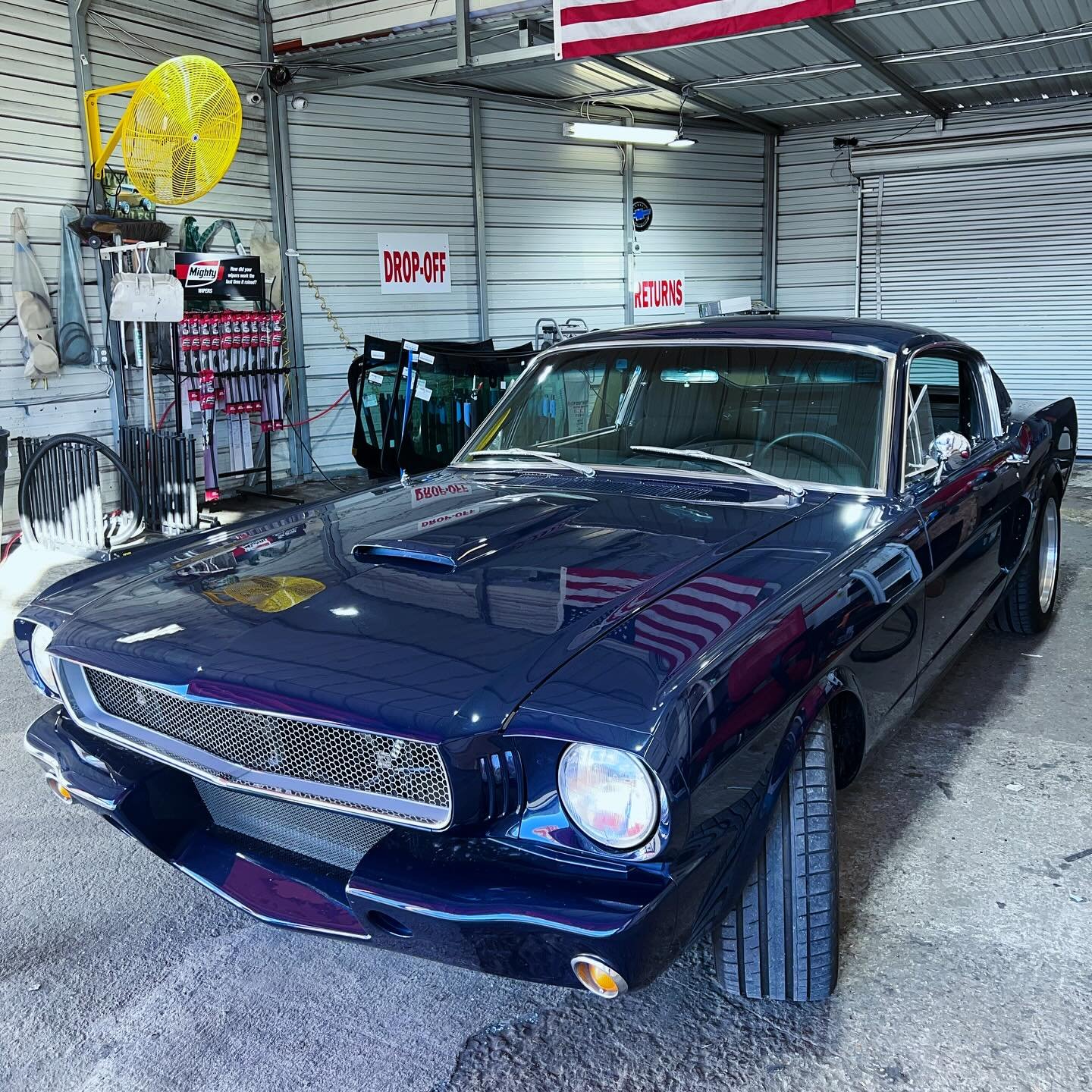 65 Mustang getting the windshield replaced. Owner just got it freshly painted and only trusts us with this beauty! #1965 #ford #mustang #detroit
