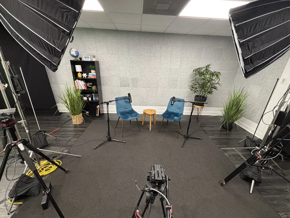 Grey wall audio podcast setup