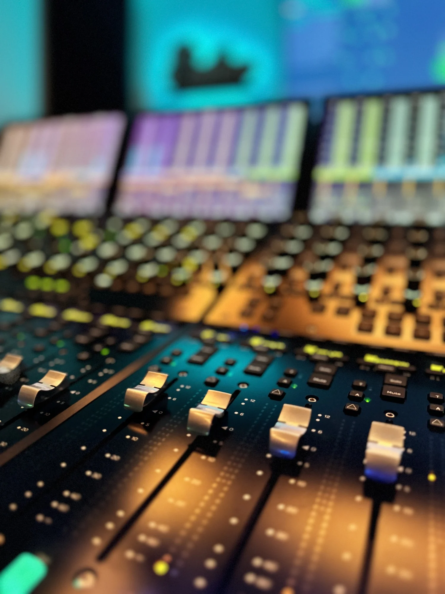 Dolby Atmos studio equipment including JBL speakers and Avid console