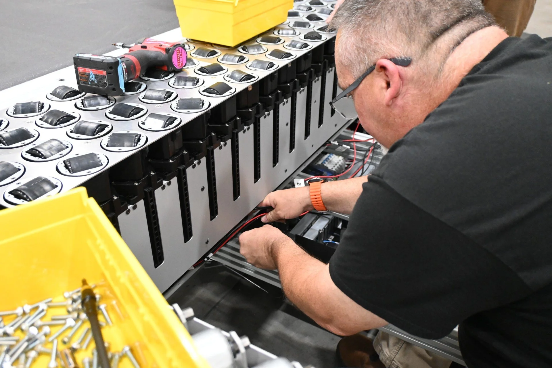 Aegis maintenance technician working on SmartSort table as part of maintenance plan.