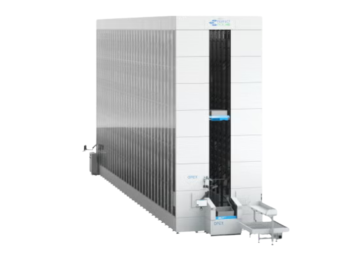 OPEX Perfect Pick automated storage and retrieval system (AS/RS) a white rectangular prism with robots inside picking products to deliver to packing stations at the bottom.