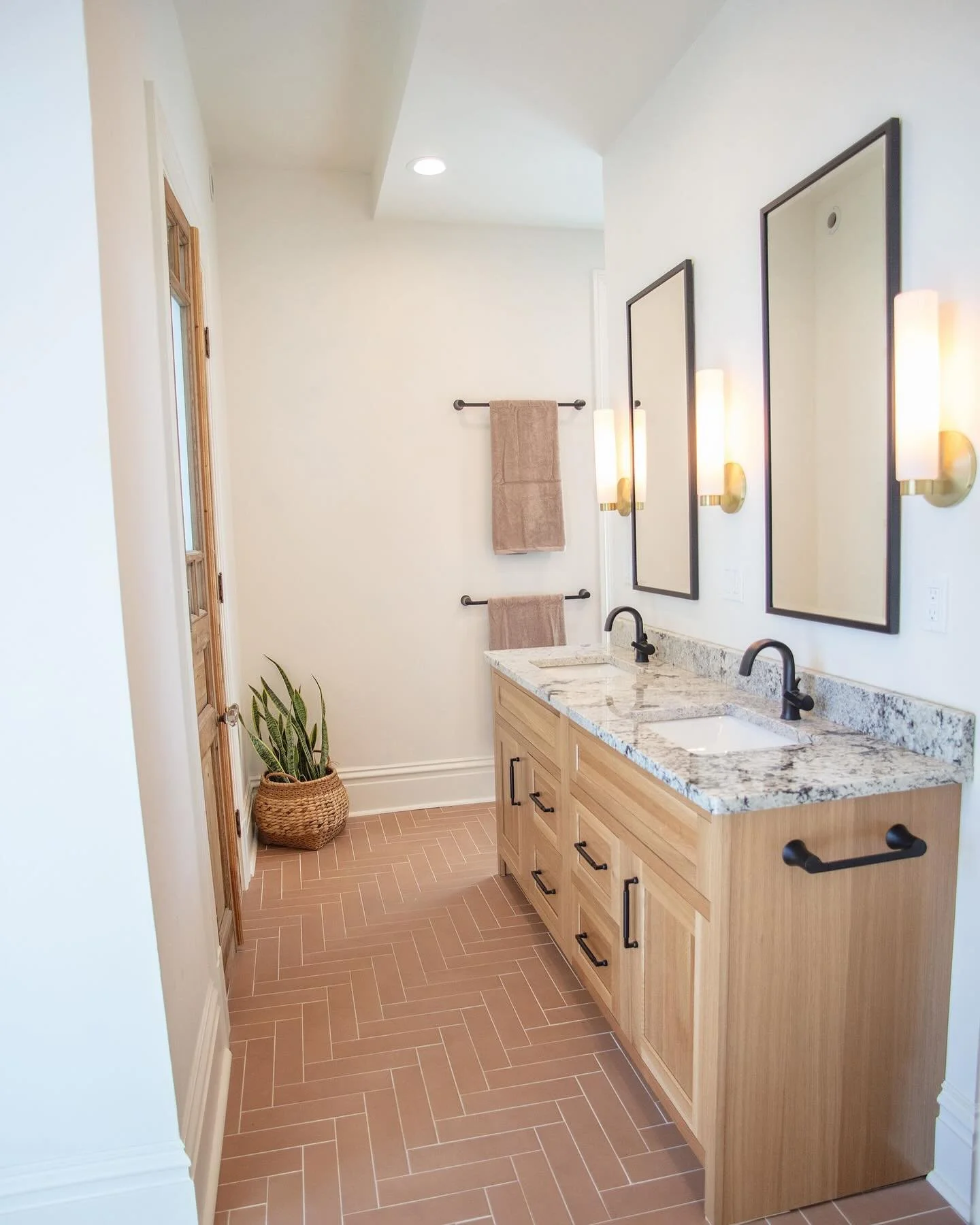 It&rsquo;s hard to believe, but this was just an extra bedroom when we started (last pic). Terracotta tile, matte textured walls, and clean lines combined with elements of patina, gives this now primary bathroom and closet space a spa-like feel. Addi