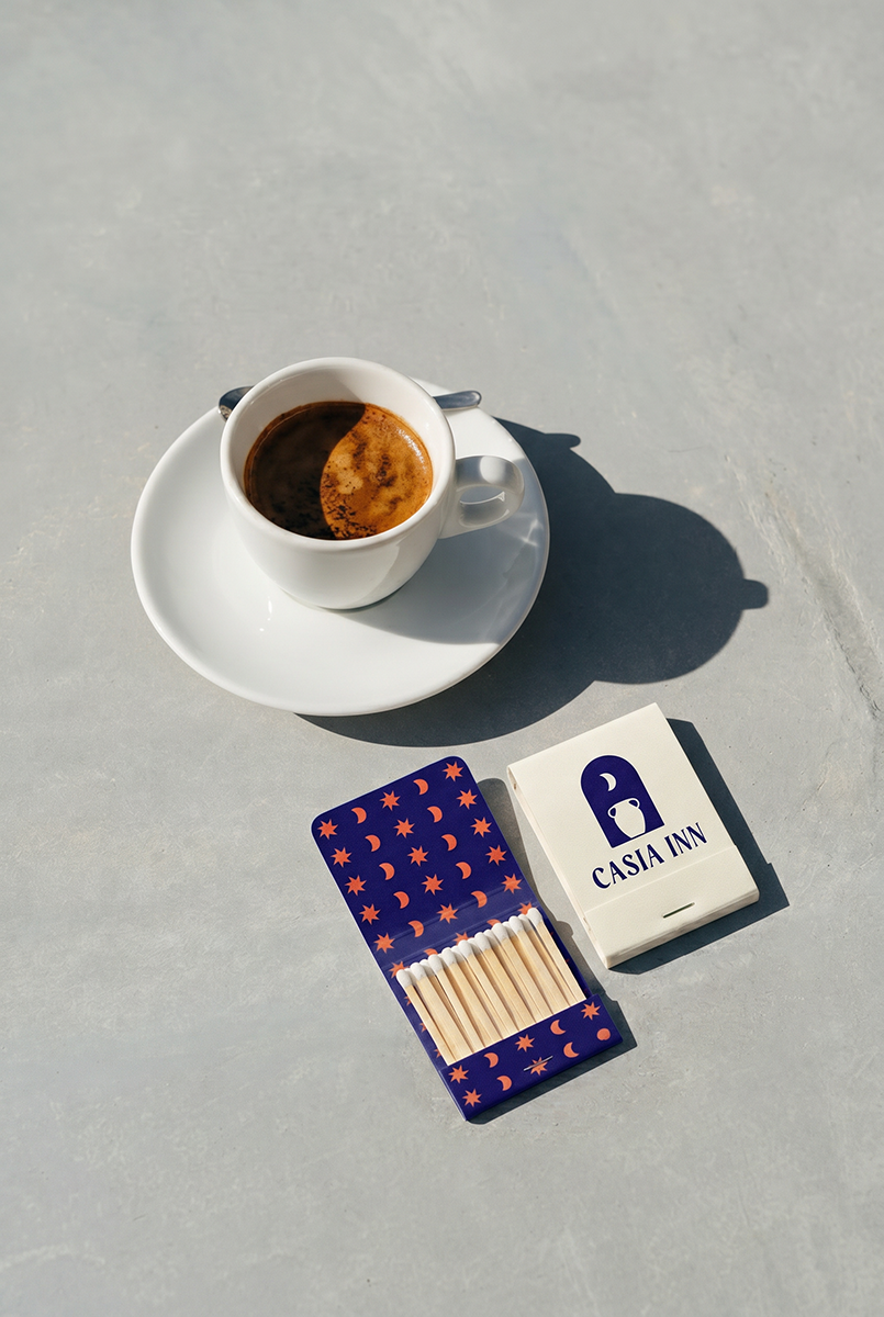 Casia Inn matchbook and coffee cup