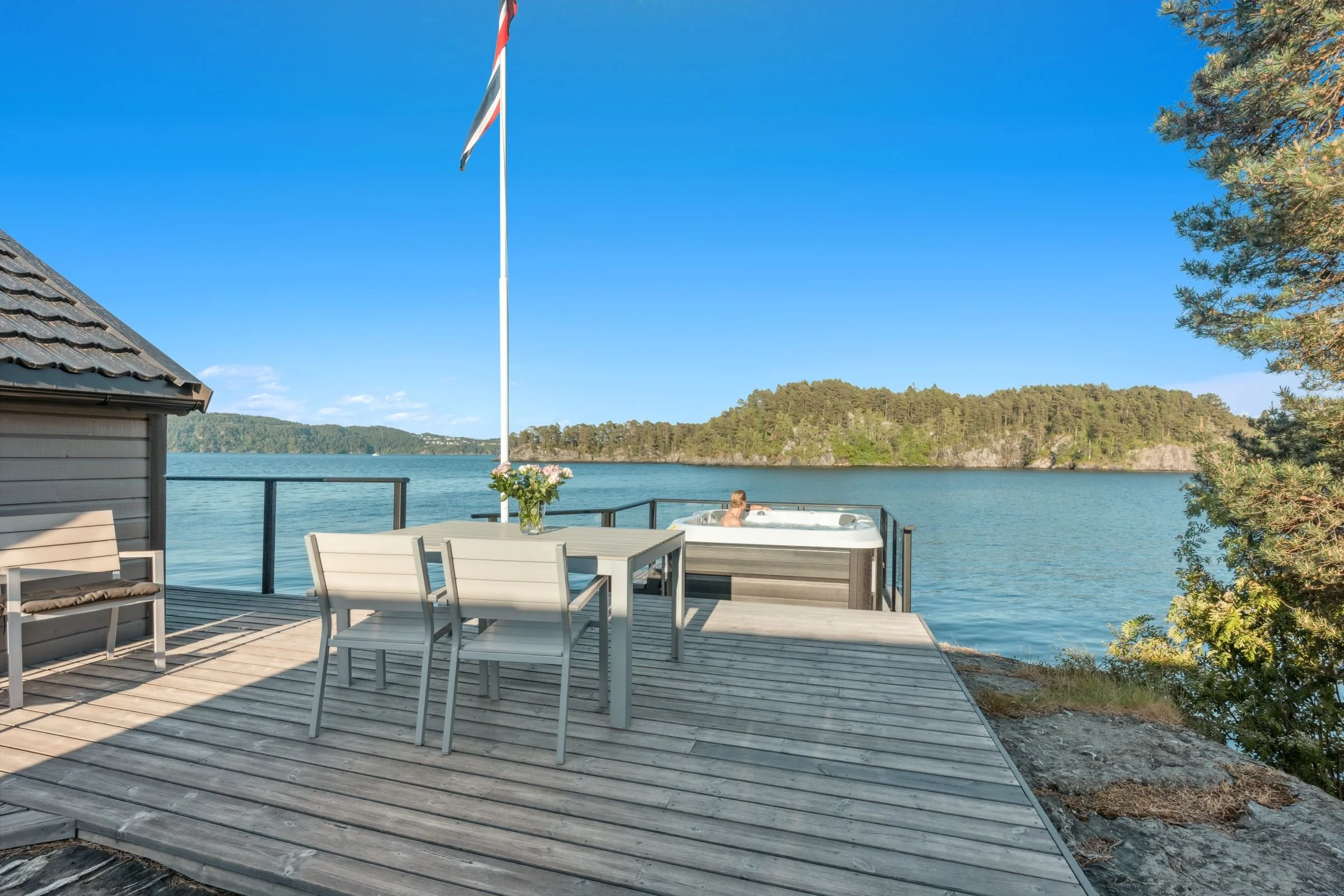 Outdoor jacuzzi at Furiholmen with sea view and peaceful surroundings