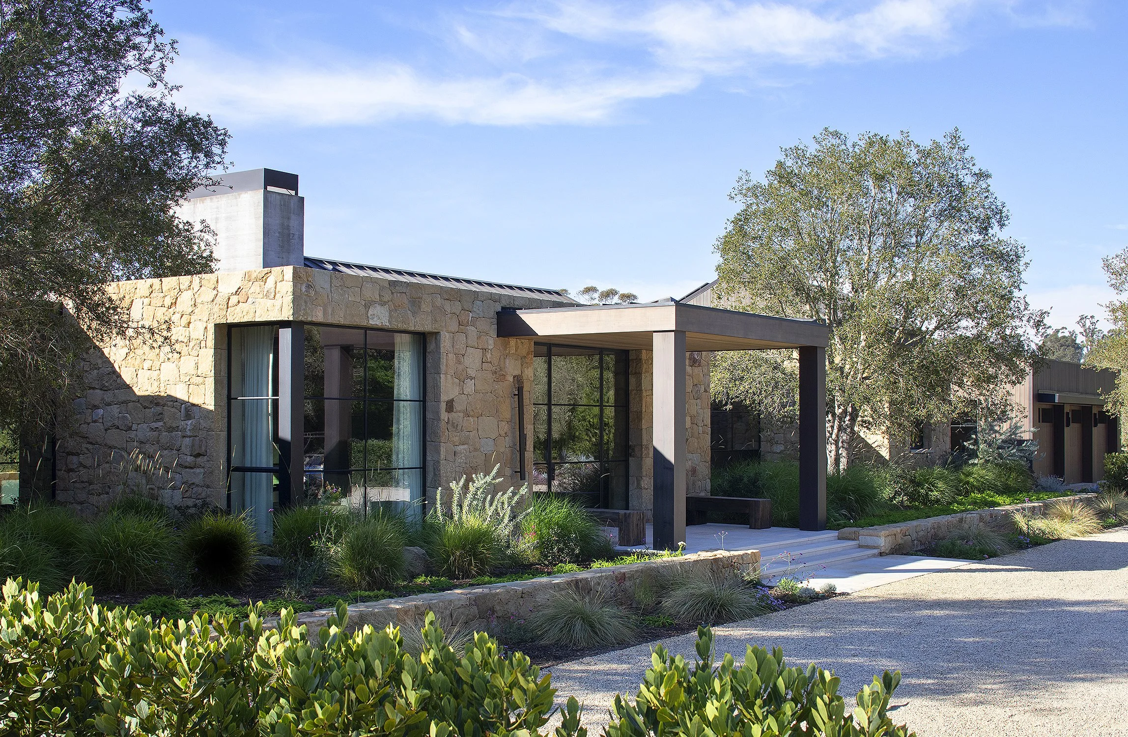 Stone facade of the main entry of a beautiful home in Montecito 