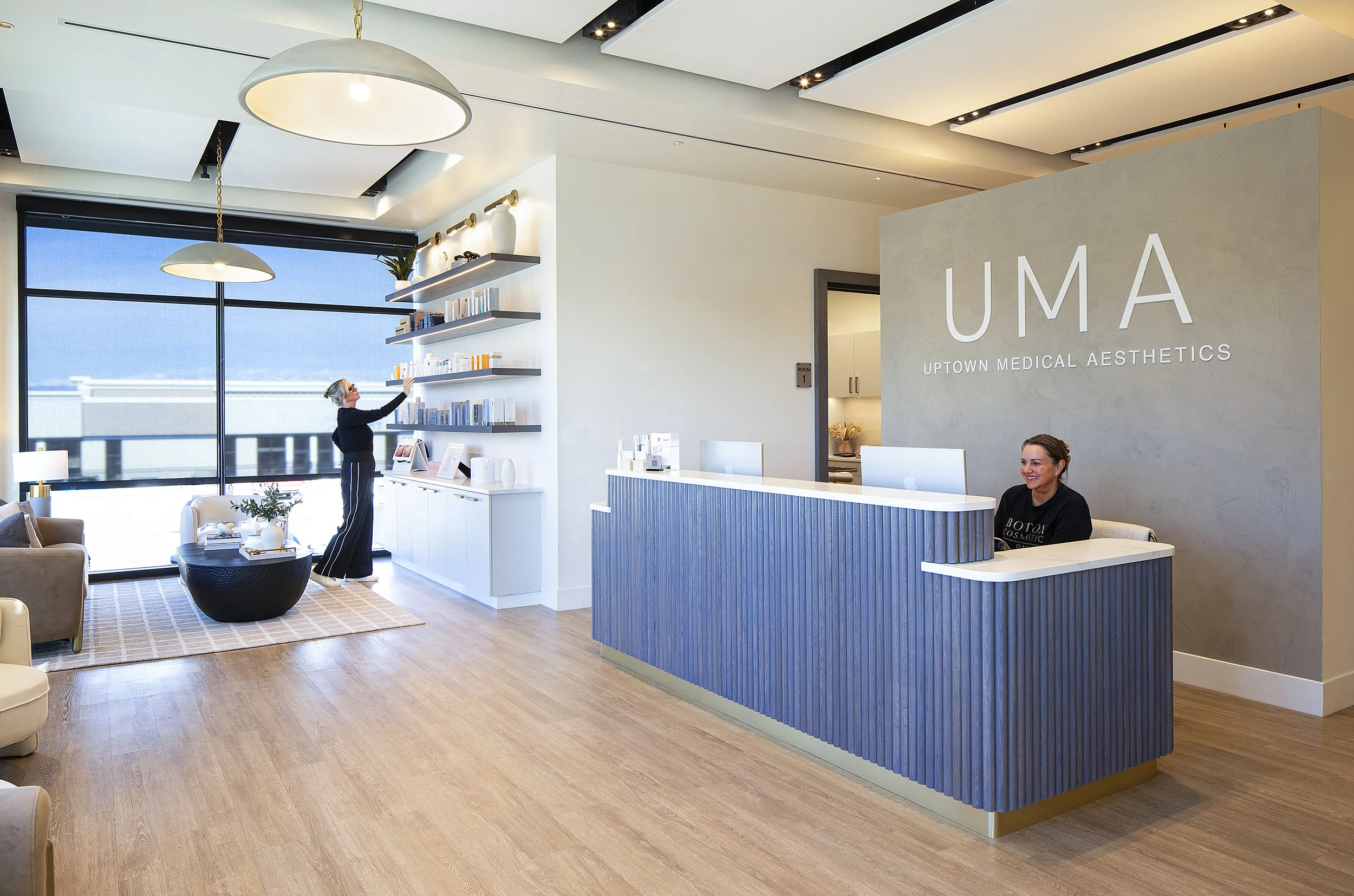 botox facility reception area with two women in black boulder Colorado 