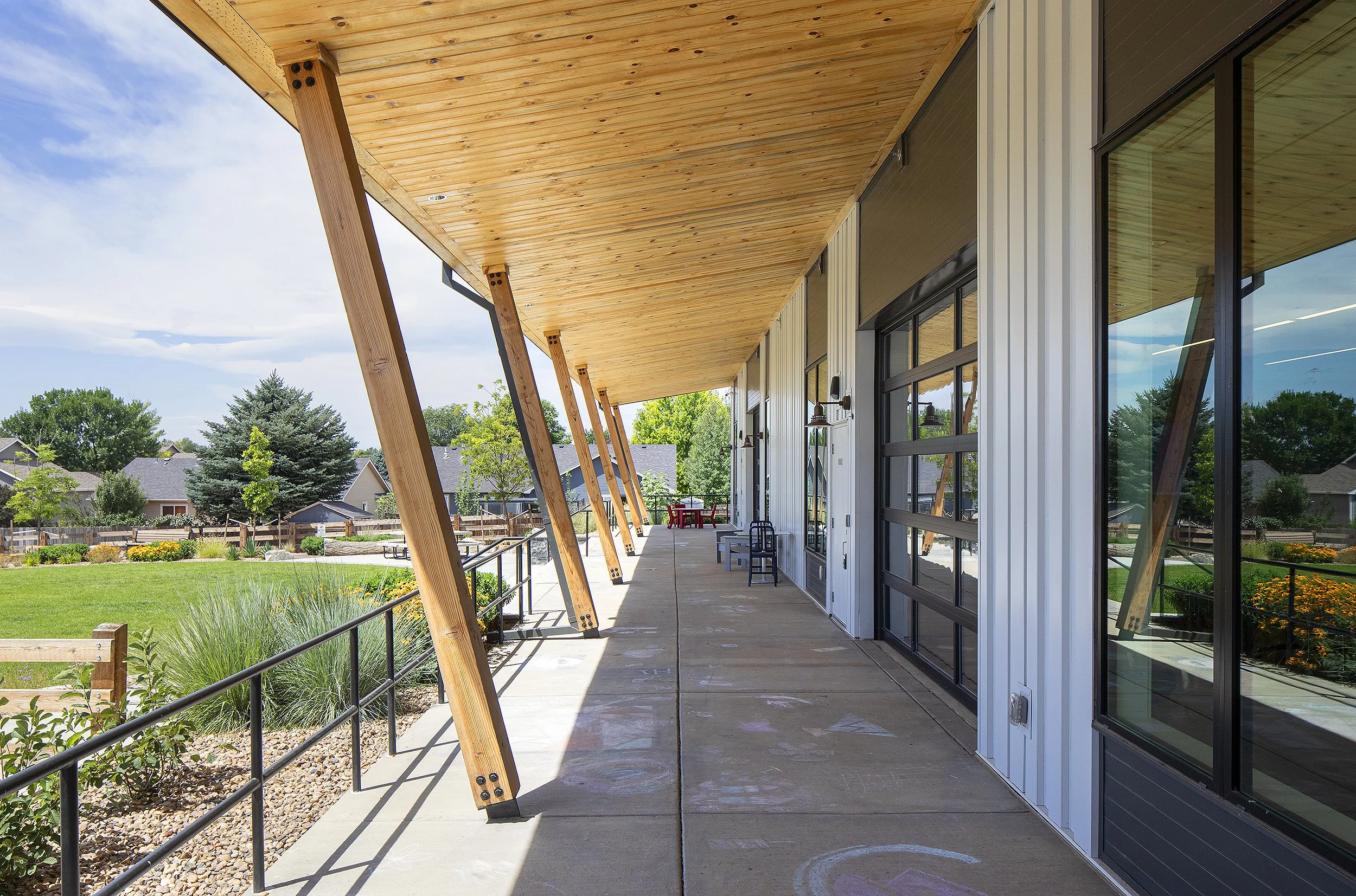 Exterior walkway of Severance library and slanted beams supporting the roof