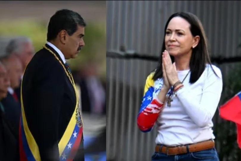 Una mujer con camiseta de los colores de la bandera venezolana y una mujer con banda presidencial en un acto público.