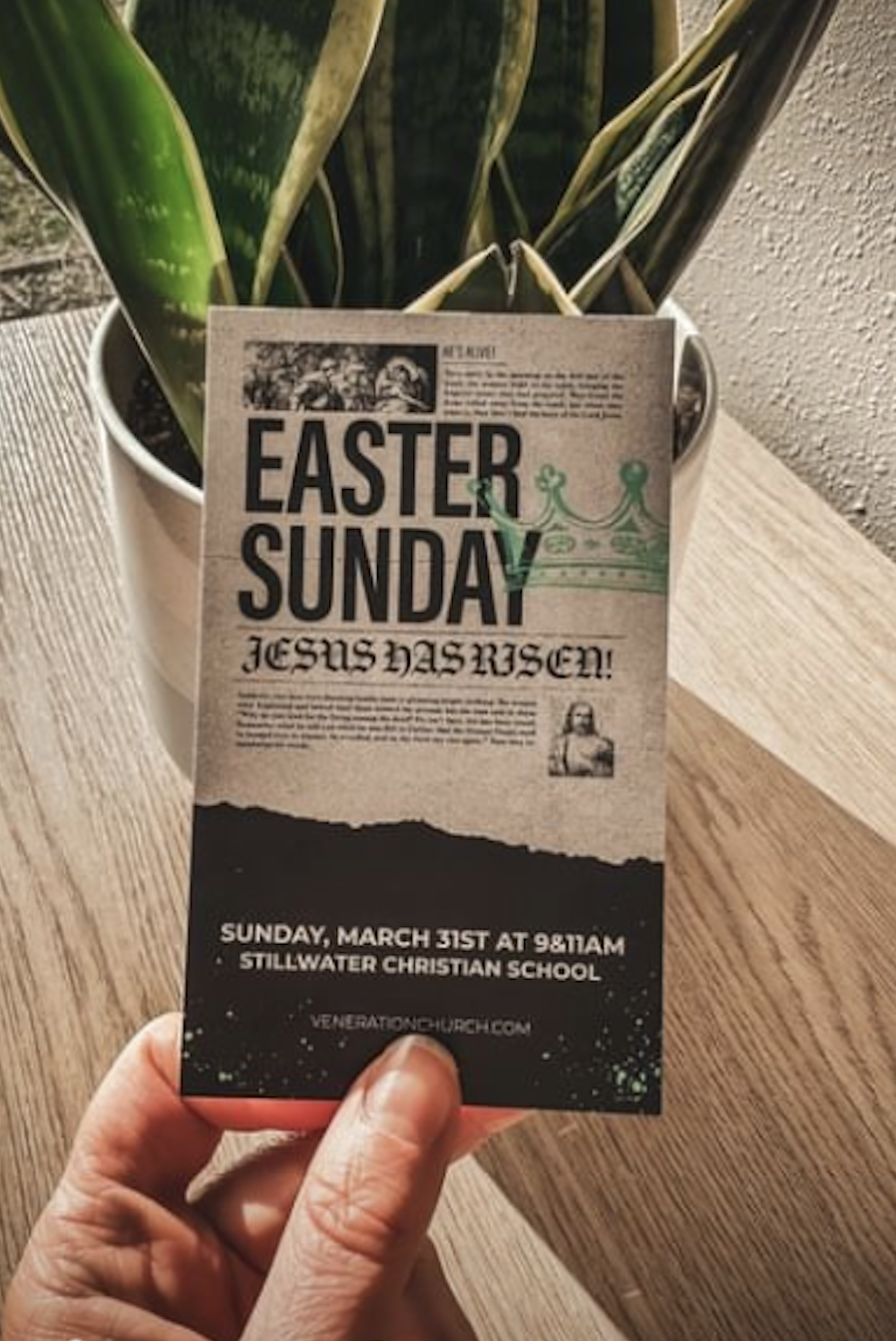 Easter Sunday invitation flyer held over a wooden table, featuring a plant in a white pot in the background. The flyer announces Easter Sunday service at Stillwater Christian School on March 31st at 9:11 AM.