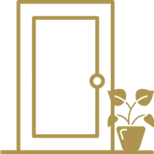 A minimalist drawing of a door with a round doorknob and a potted plant with leafy branches beside it.