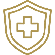 A shield with a medical cross in the center, outlined in gold.