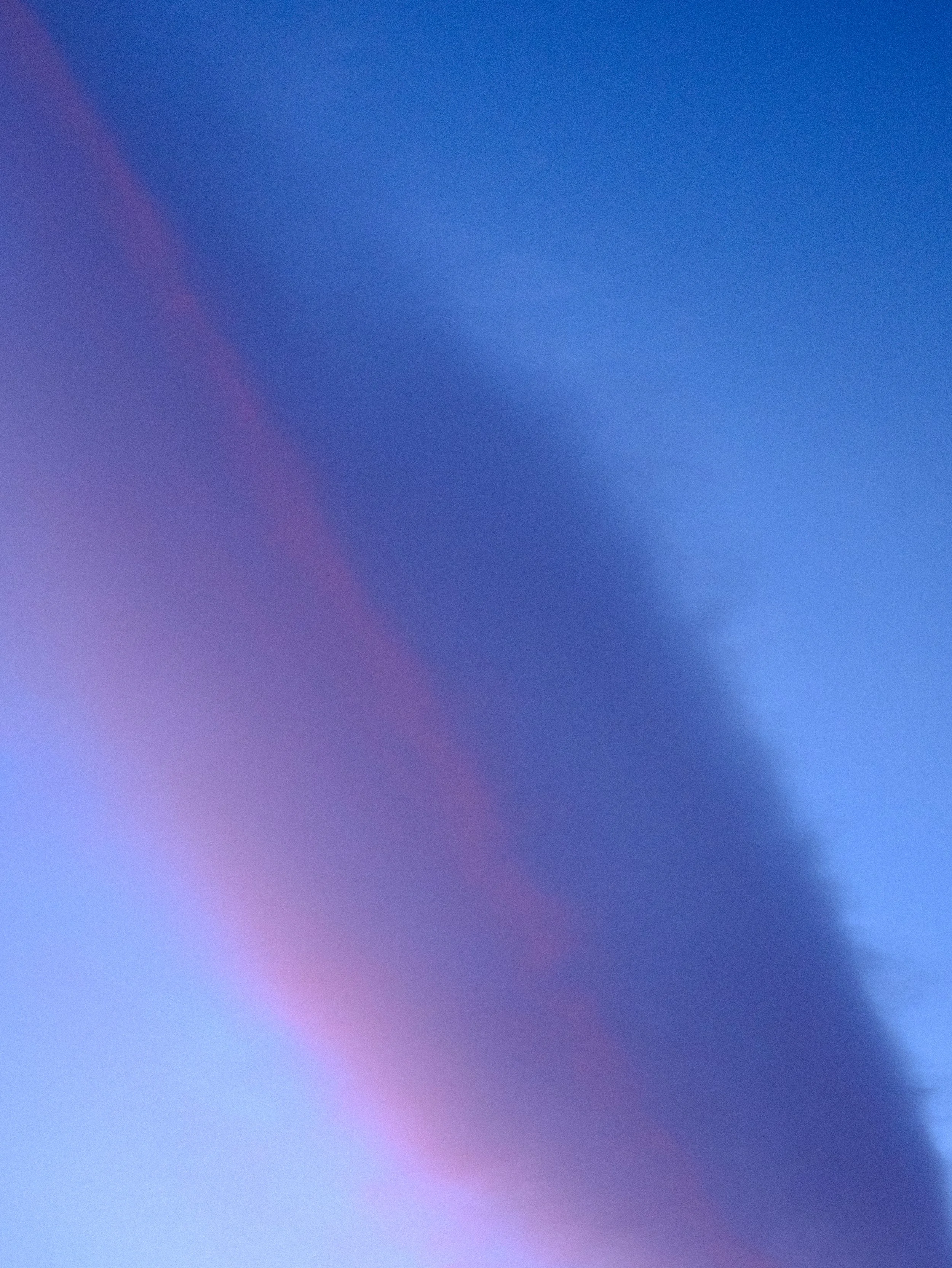 image of the sky with different shades of blue and pink in an ombre effect