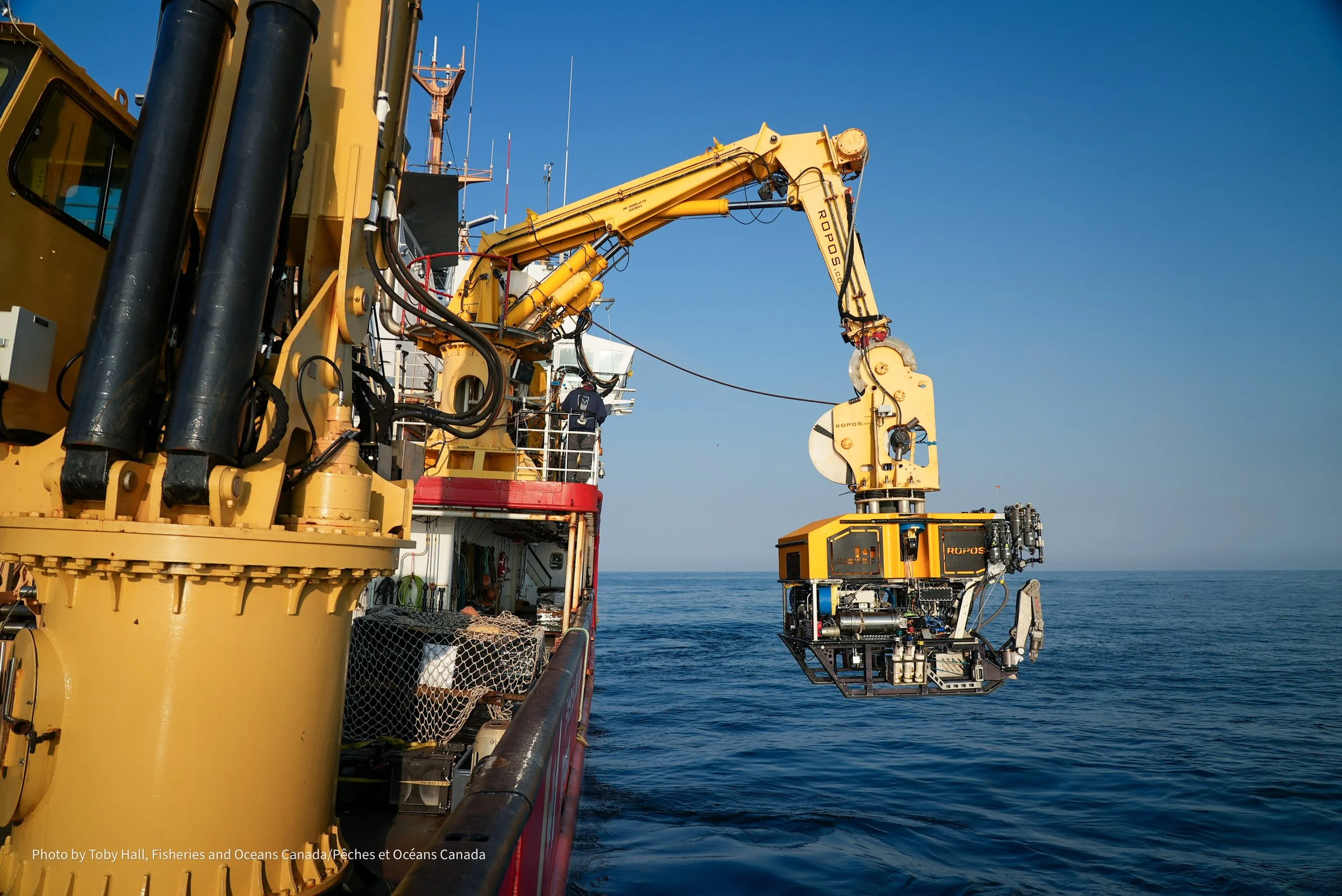 To gather imagery, sensor data, and physical samples we use a remotely operated vehicle (ROV) that gets deployed from the vessel.  Pictured here is the ROV ROPOS.