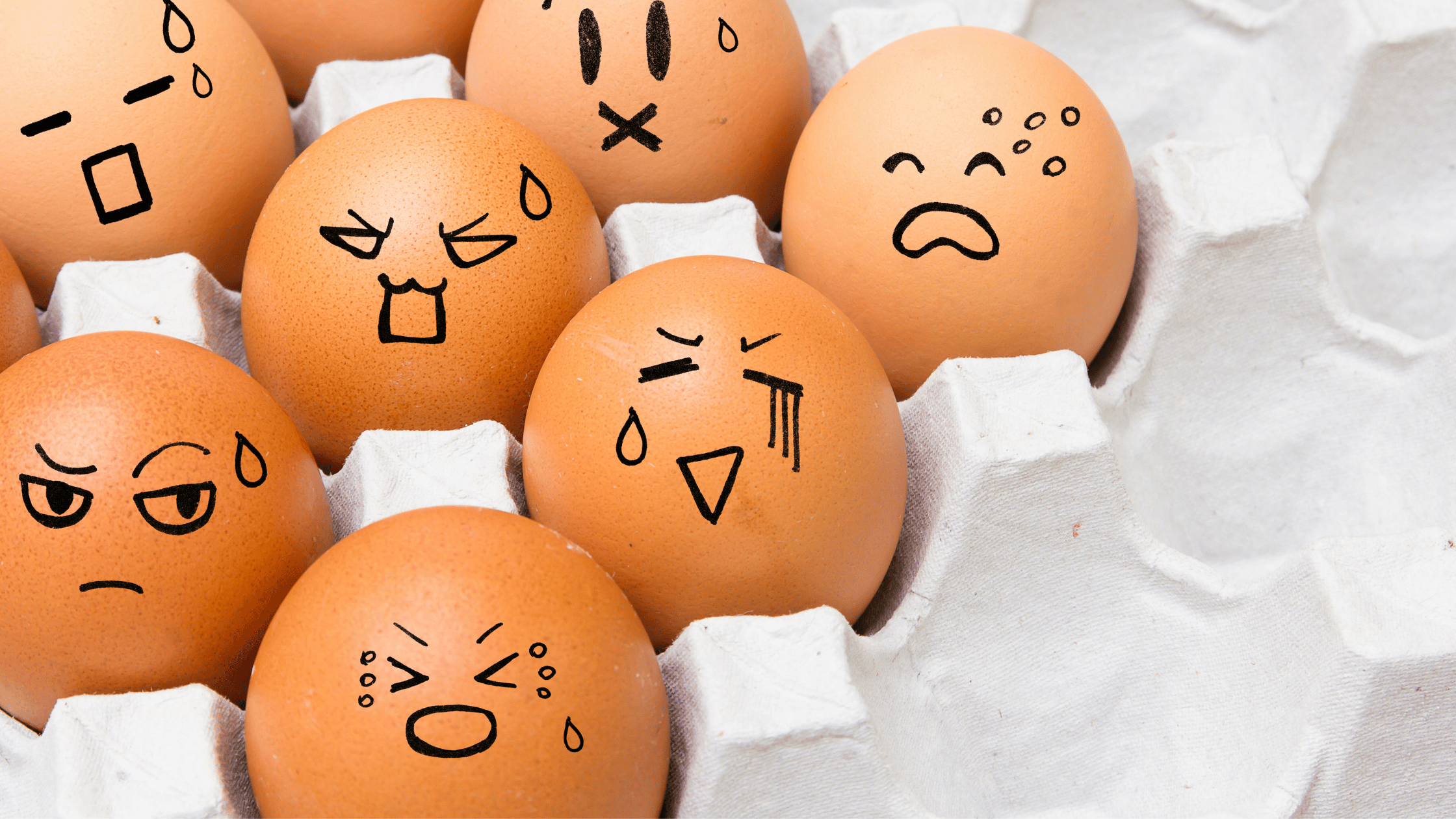 Eggs with emotions drawn on them