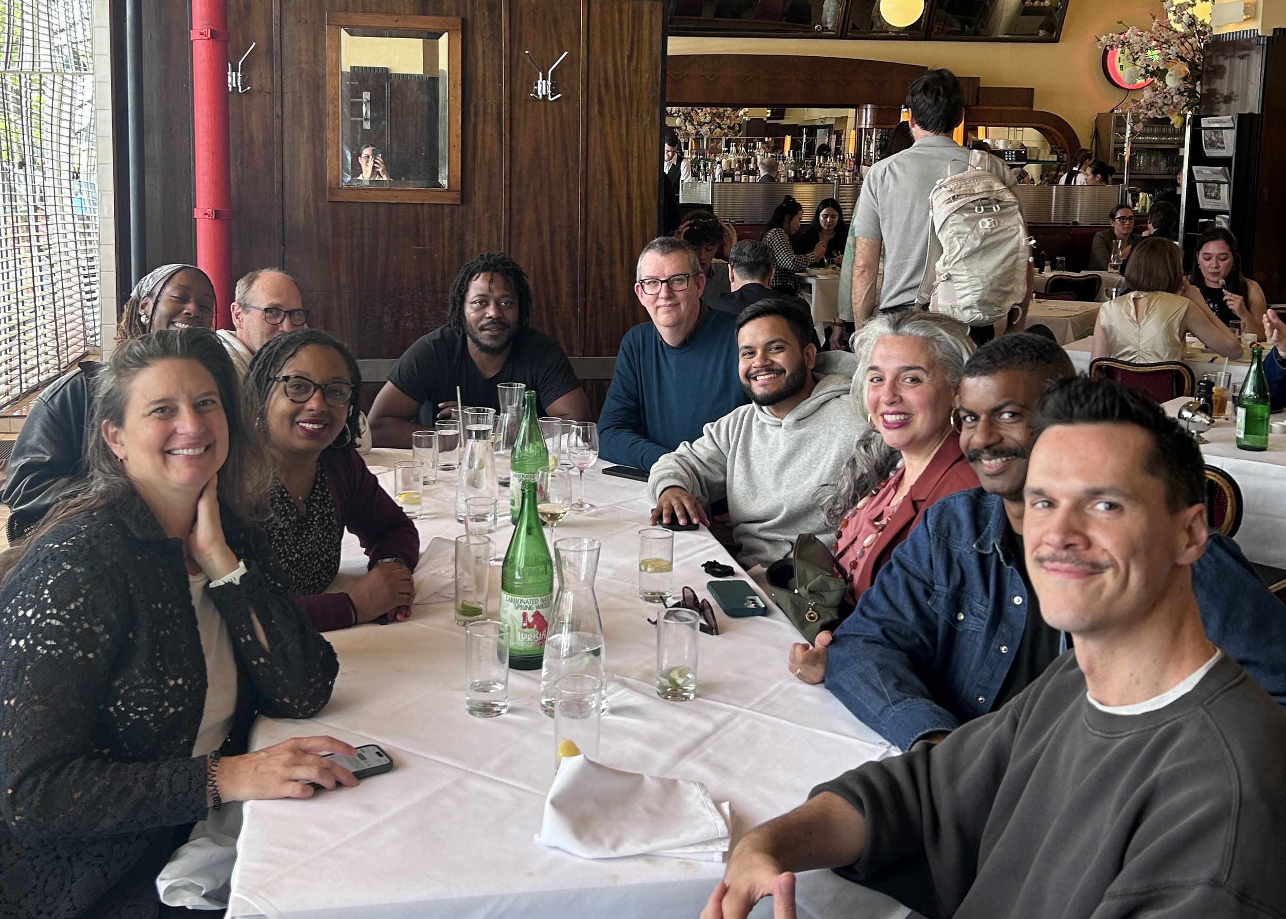 Flea Staff at our "conference room," aka The Odeon for a celebratory lunch (2025).