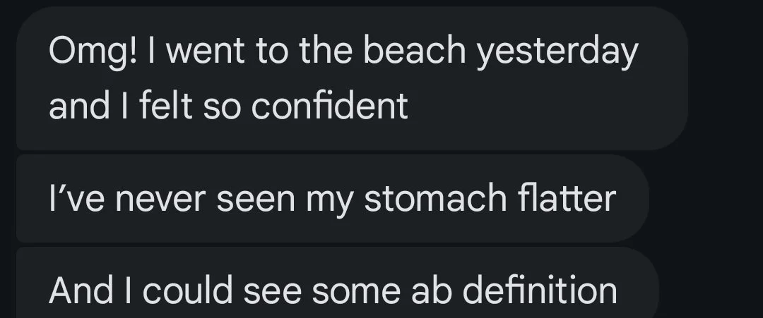 A screenshot of a text message conversation where someone expresses excitement about going to the beach, feeling confident, seeing their stomach flatten, and viewing some abdominal definition.