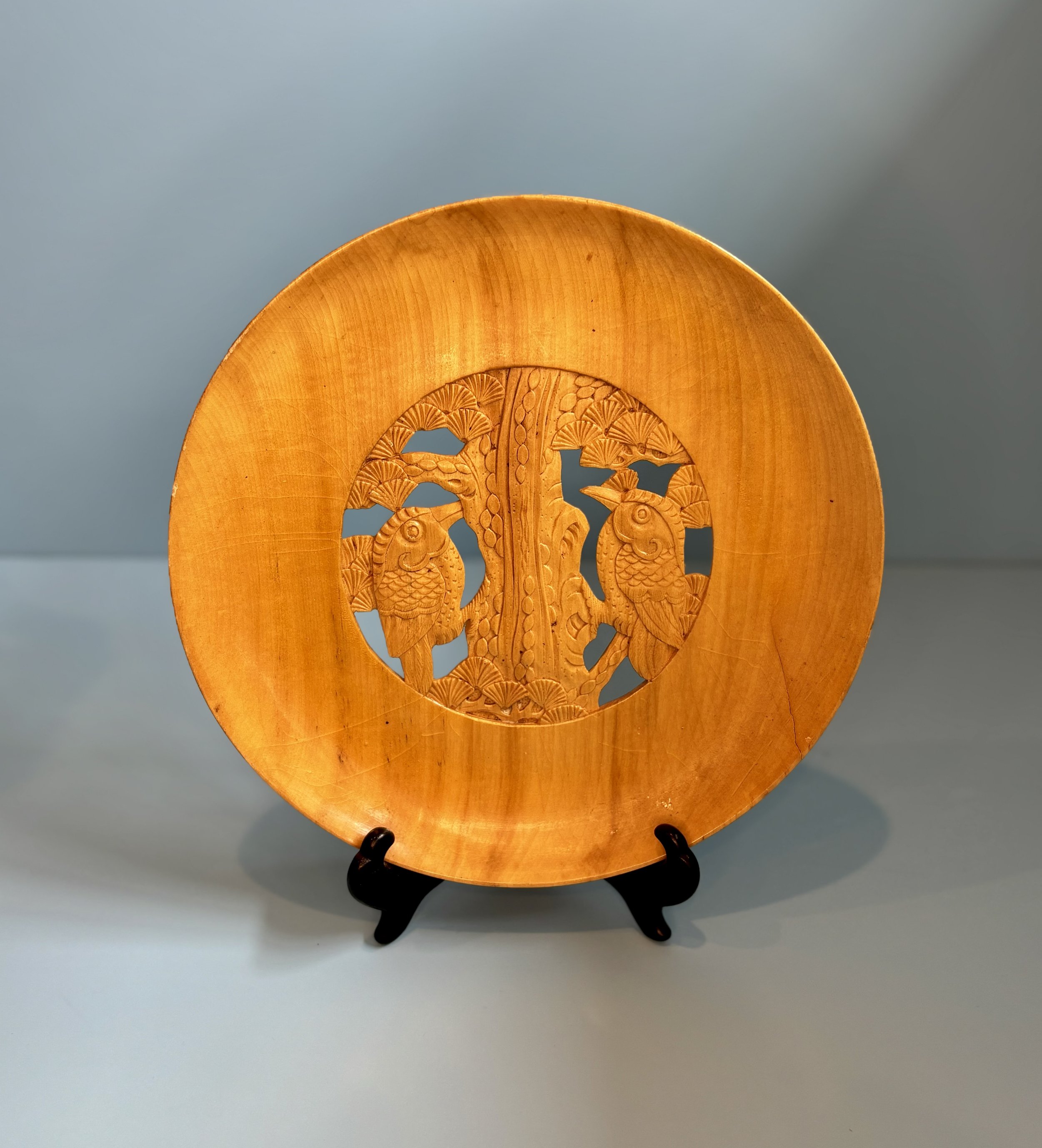 It's hard to say where this hand-carved WOODEN PLATE hails from (Poland? South America?) but the detail is exquisite. Cutaway plaques look great on solid colored walls, letting the background color peek through. 