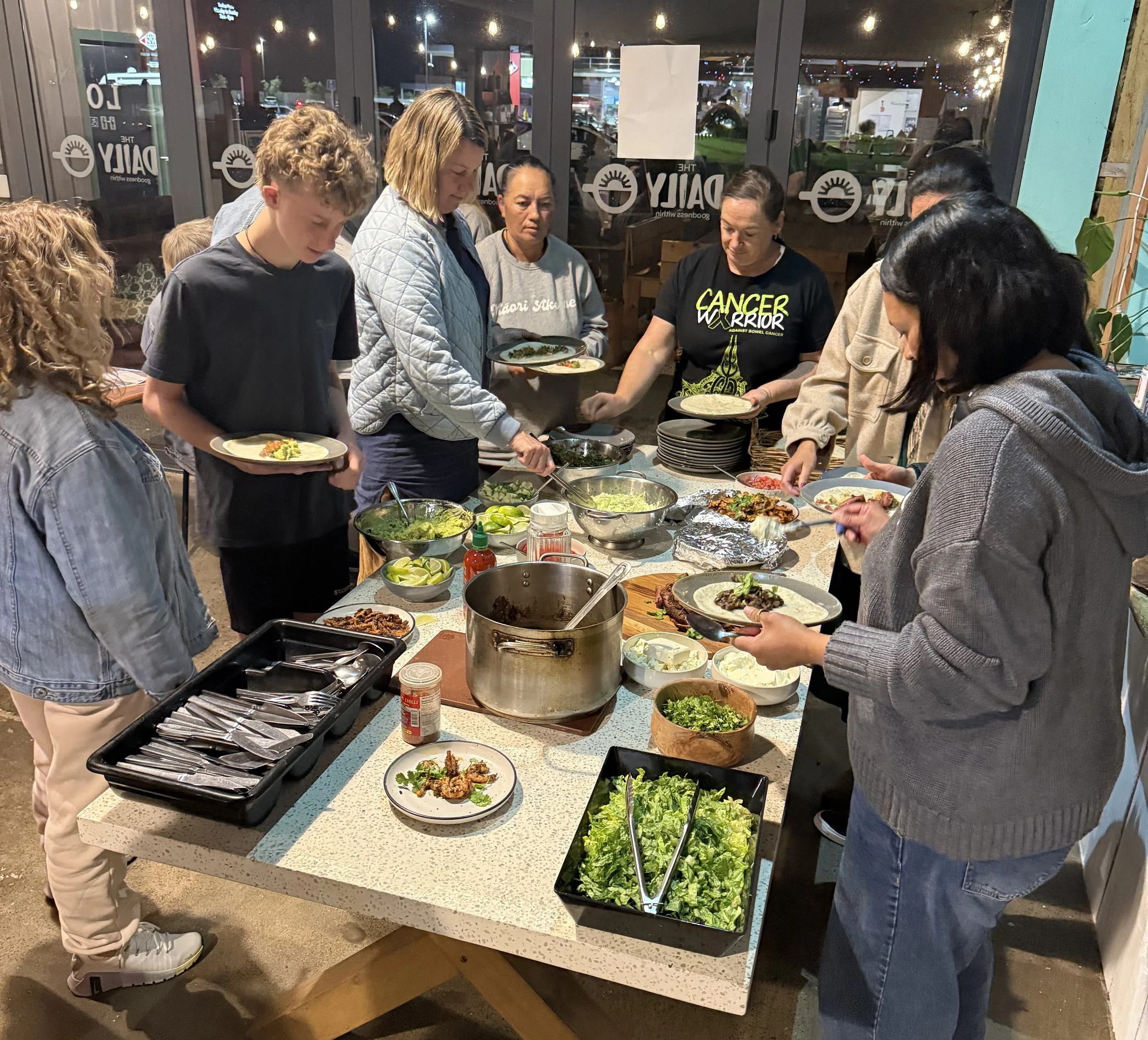BOP_Te Puke_group eating food.jpg