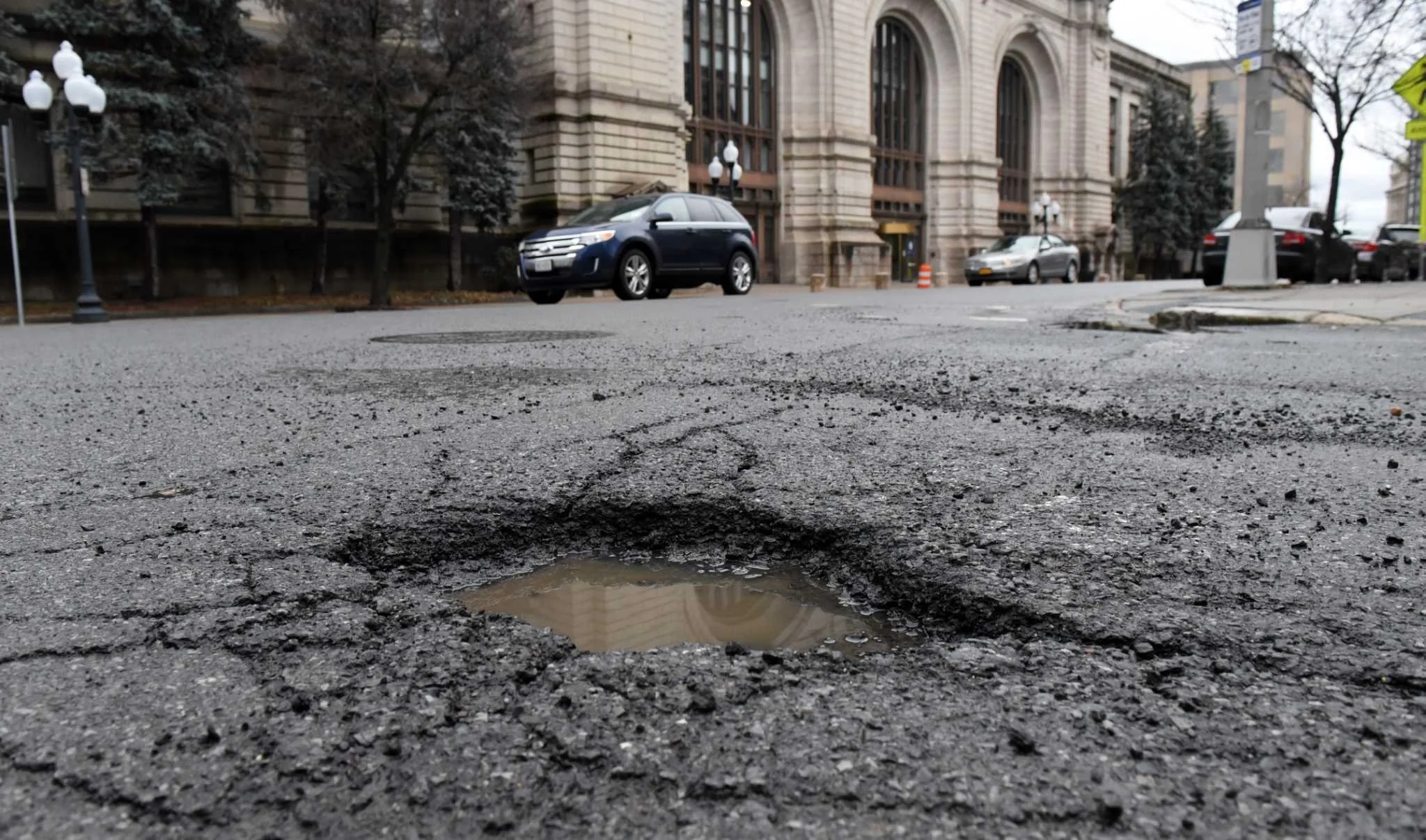 Albany's Pothole Season Is Here — And Your Driveway Needs Attention