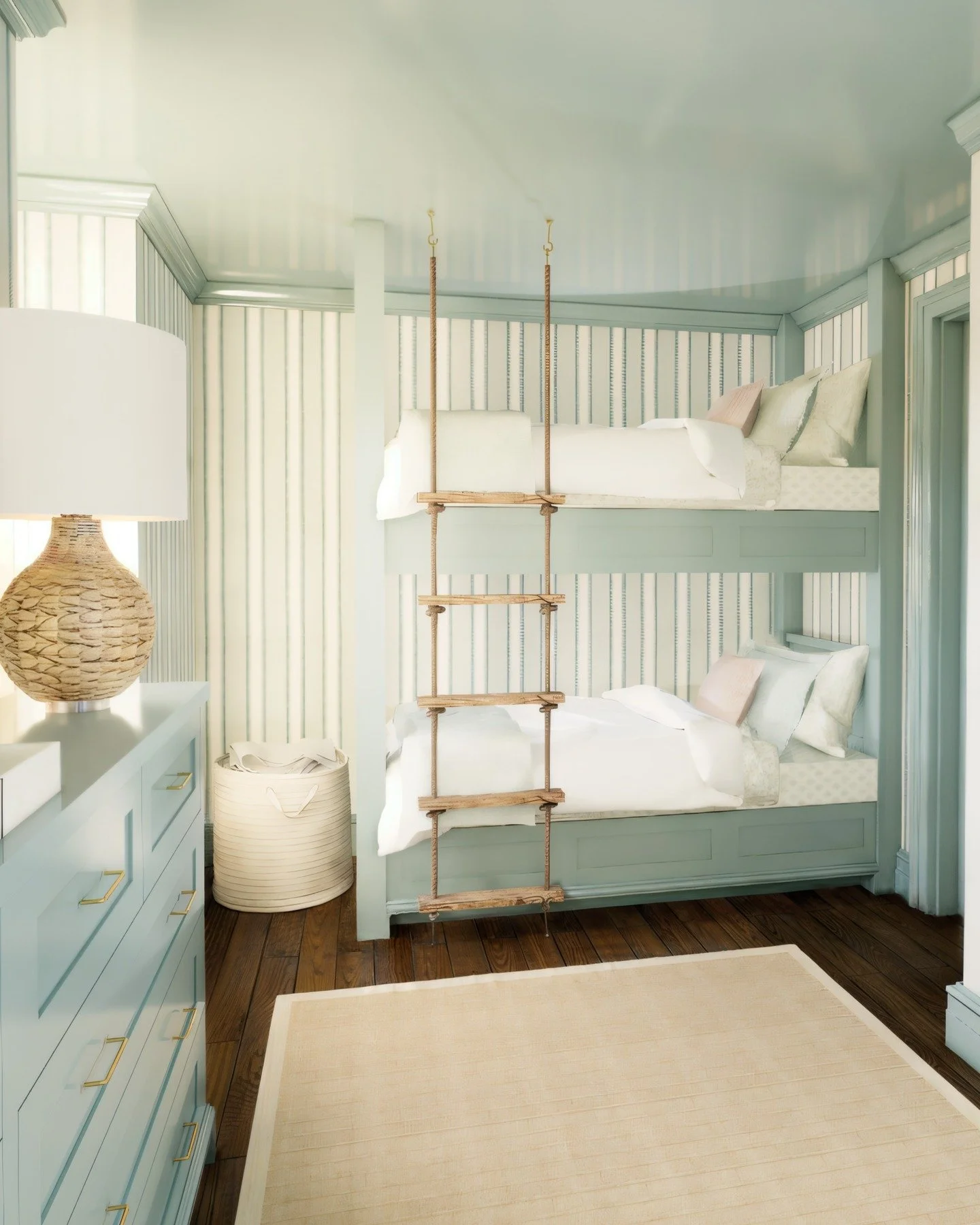 Little sailors welcome. Rope ladders, breezy blues, Cowtan &amp; Tout textiles, and Ernesta custom rugs tie it all together ⚓️

#BeachHouseStyle #CoastalKidsRoom #BunkRoomGoals #NauticalDesign #InteriorArchitecture #BuiltInBeds #CustomRug #WallpaperL