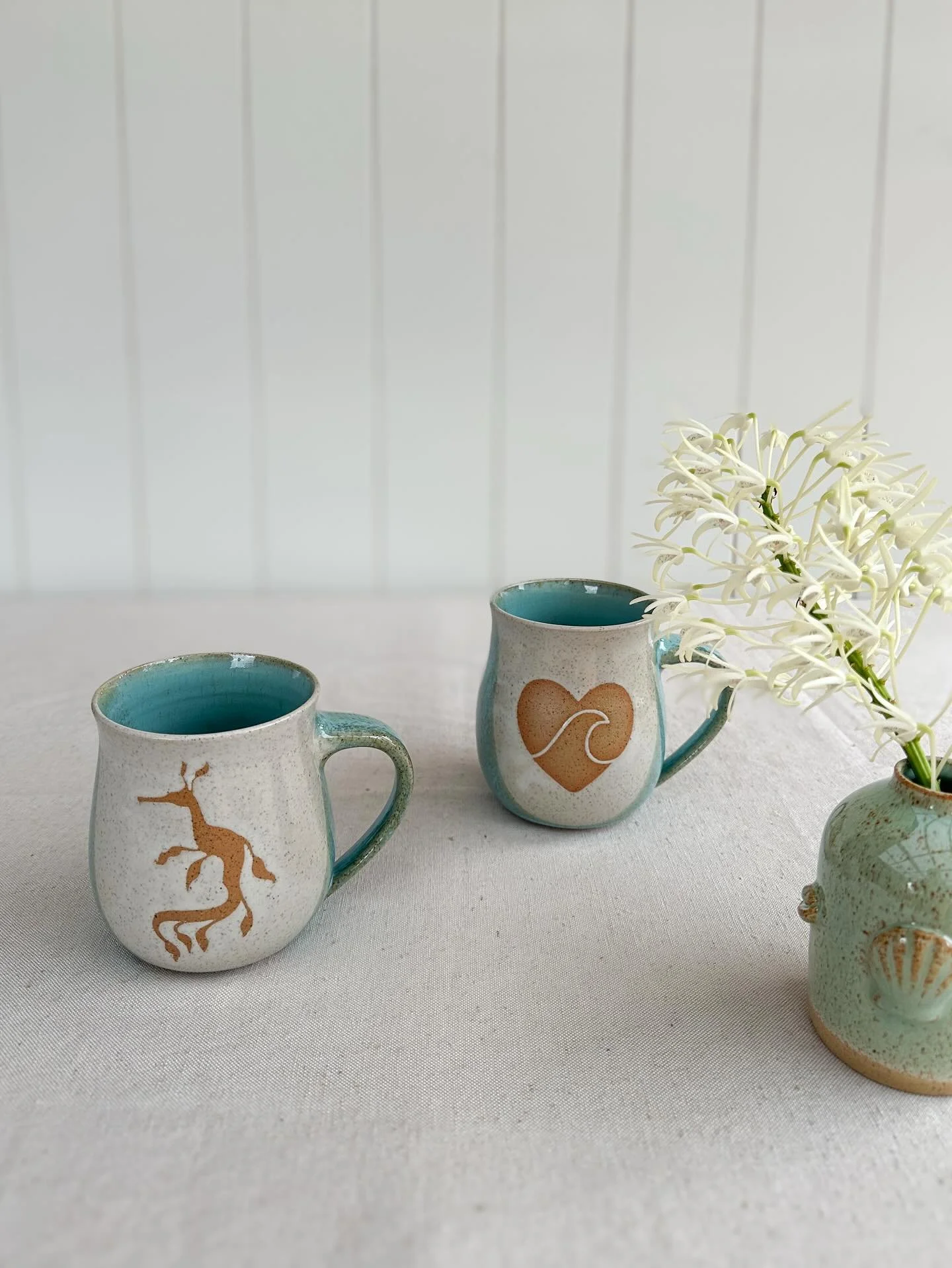 🤍🩵 Restock 🩵🤍

Just added a few more Weedy Sea Dragon and Ocean Lover belly mugs to the website. 

🌊