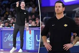 Lakers head coach JJ Redick laces up custom-made Nike sneakers for Autism Acceptance Month
