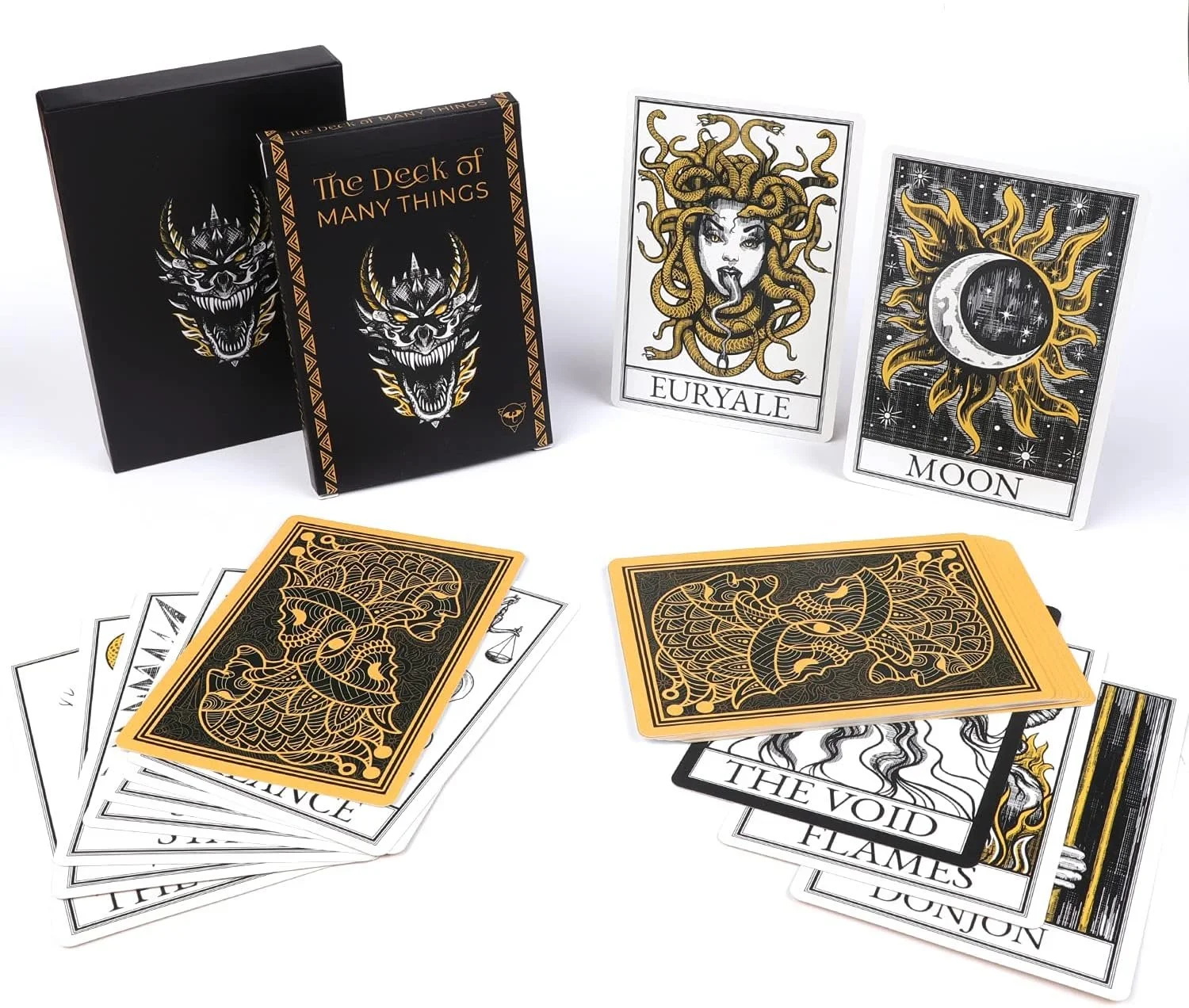 The D&D magical item 'The Deck of Many Things' with black, gold, and white artwork, including cards labeled 'Eurayle' and 'Moon,' some cards face up with intricate designs and others face down, along with a black box for storage.