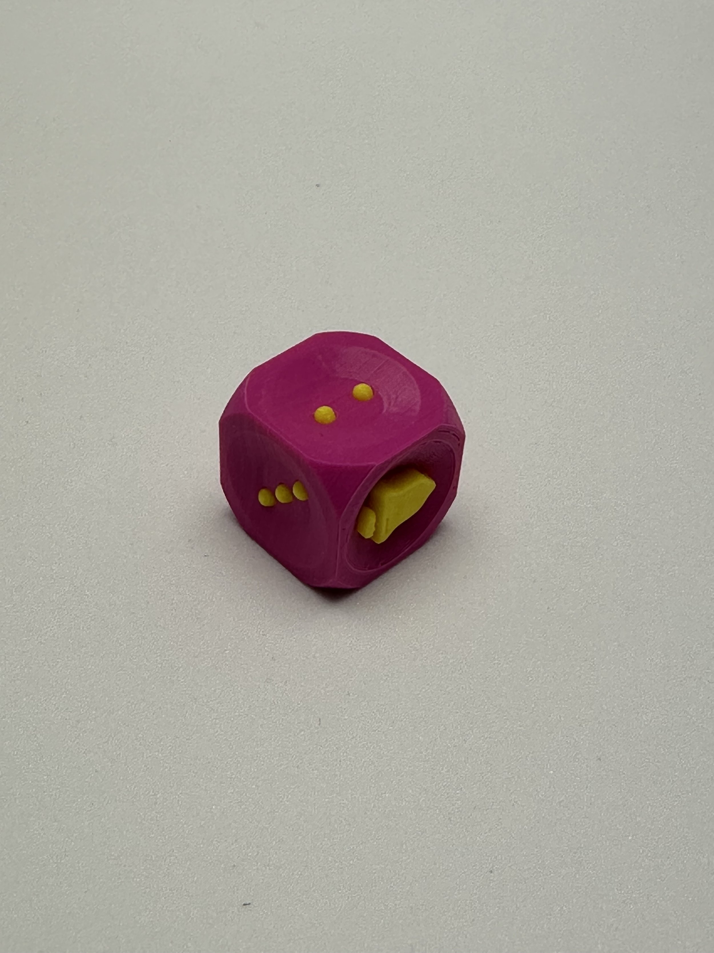 1 Pink and sunshine yellow bell D6 on a white background, showing sides 2, 3 and 6 (bell).