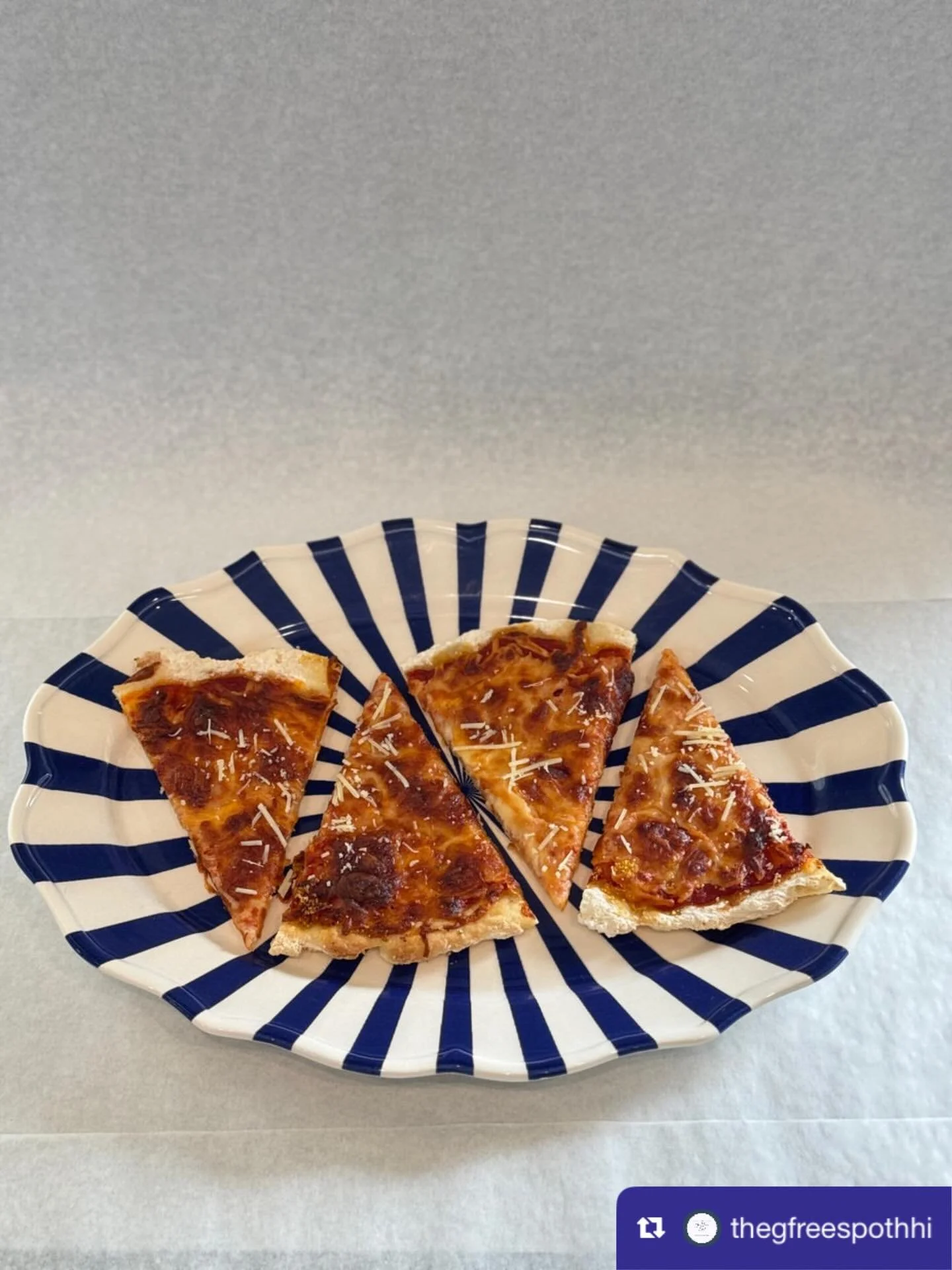 from @thegfreespothhi: Enjoy a delicious moment with our cheesy slices, perfect for sharing with friends or family. 🍕 #TheGFreeSpot #HiltonHeadEats #BakeryDelights #ArtisanDesserts