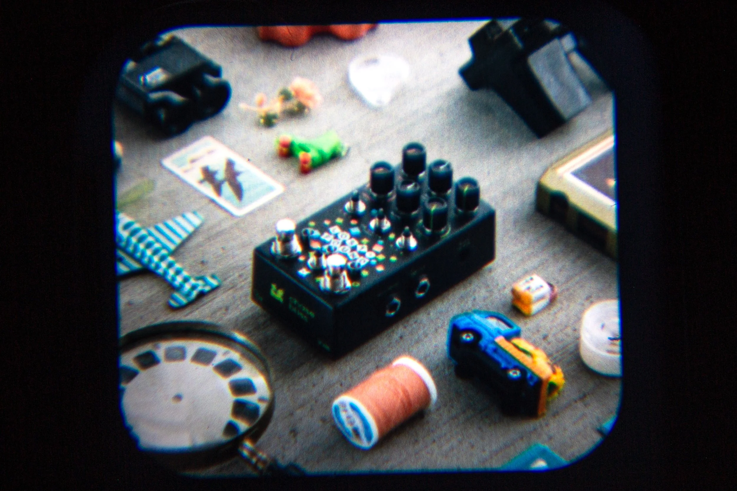 The new 2026 Lost + Found on a table surrounded by a bunch of trinkets.