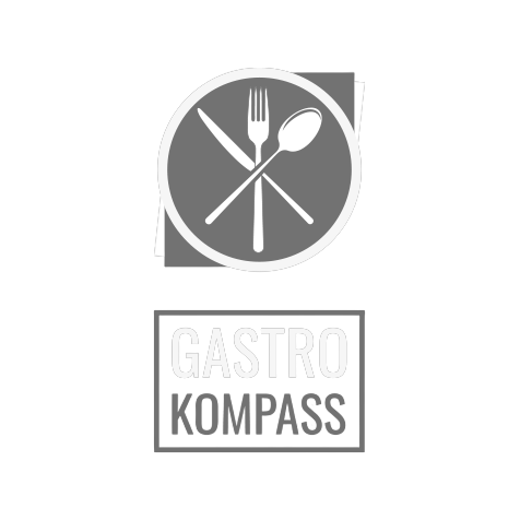 Logo with a fork, knife, and spoon crossed inside a circle above the text 'Gastro Kompass.'