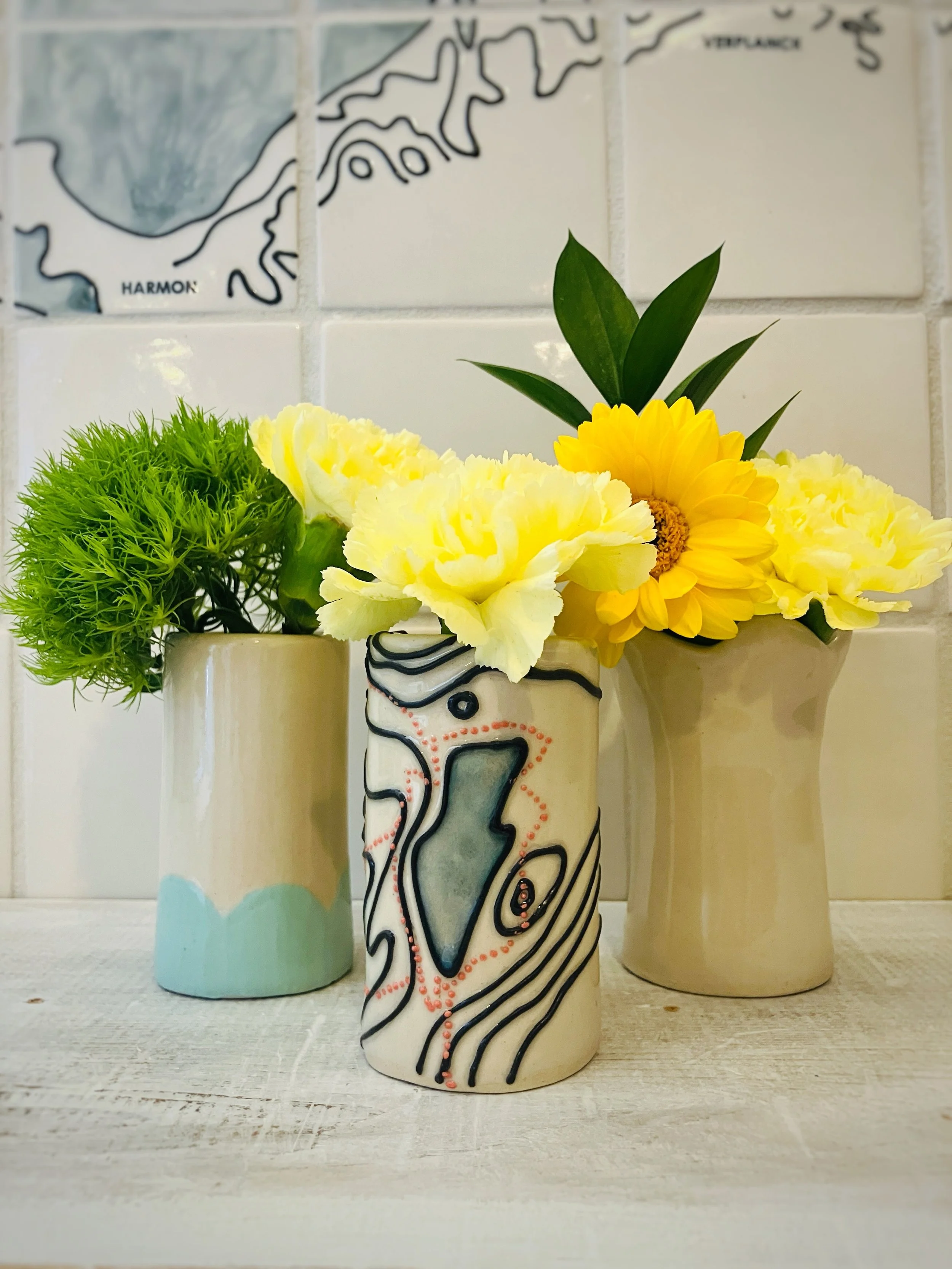 Handbuilt ceramic bud vases at the Olive Free Library