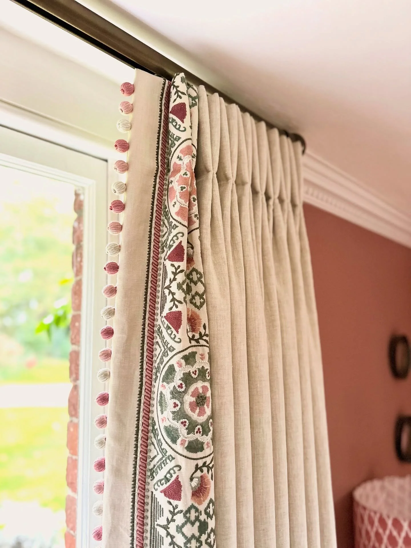 The beauty of bespoke handmade curtains is truly in the details. The knowledge and craftsmanship involved, the careful combining of elements, and thought behind every pleat and stitch to provide a finished product that not only functions beautifully,