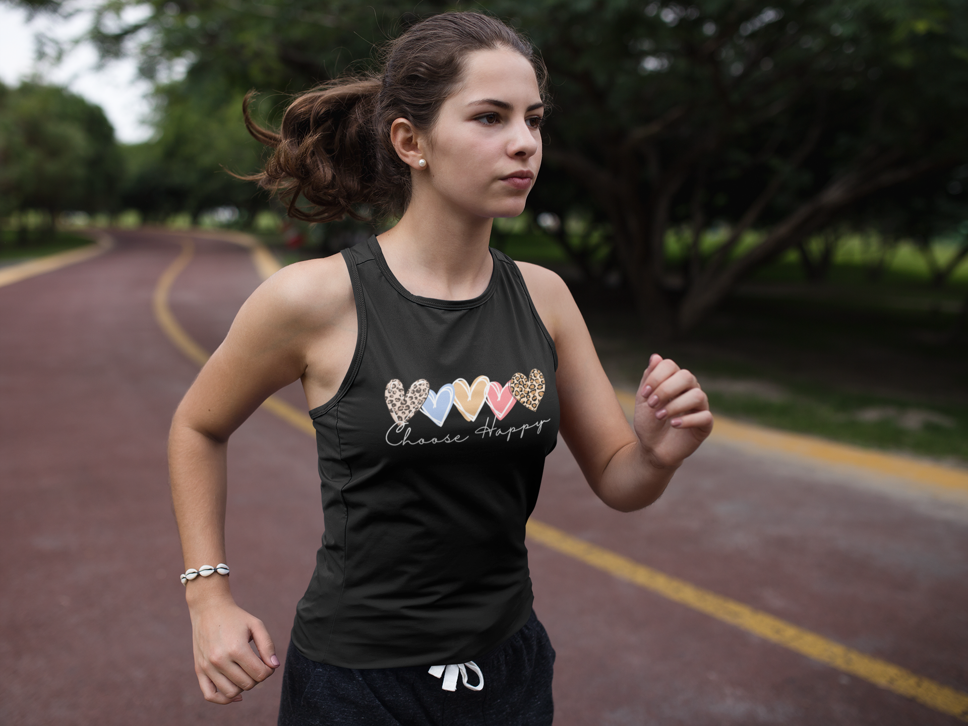 woman-running-at-a-running-track-while-wearing-custom-sportswear-mockup-a16860.png