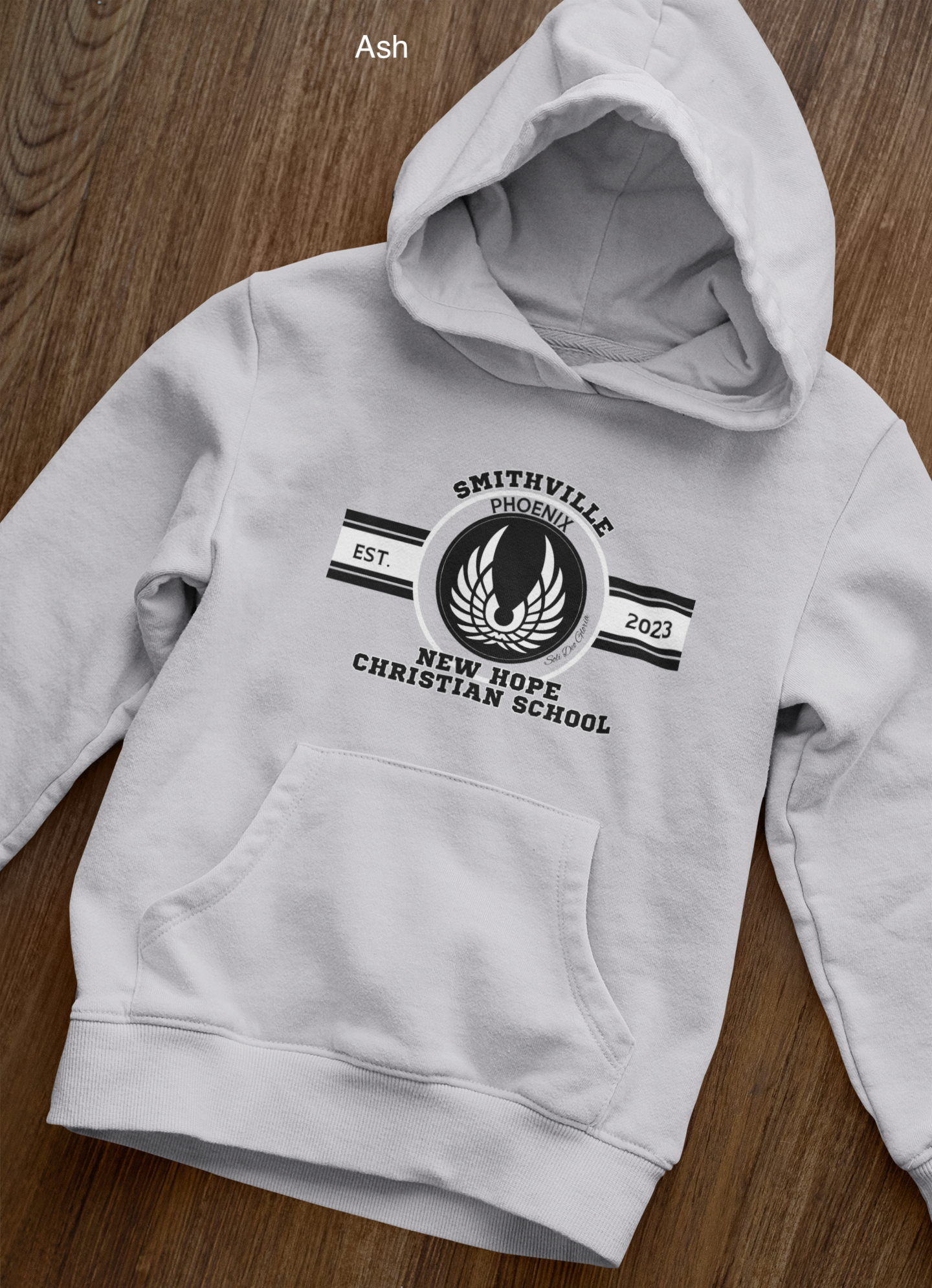 front-view-mockup-of-a-pullover-hoodie-laid-over-a-wooden-surface-33871 copy 34.png