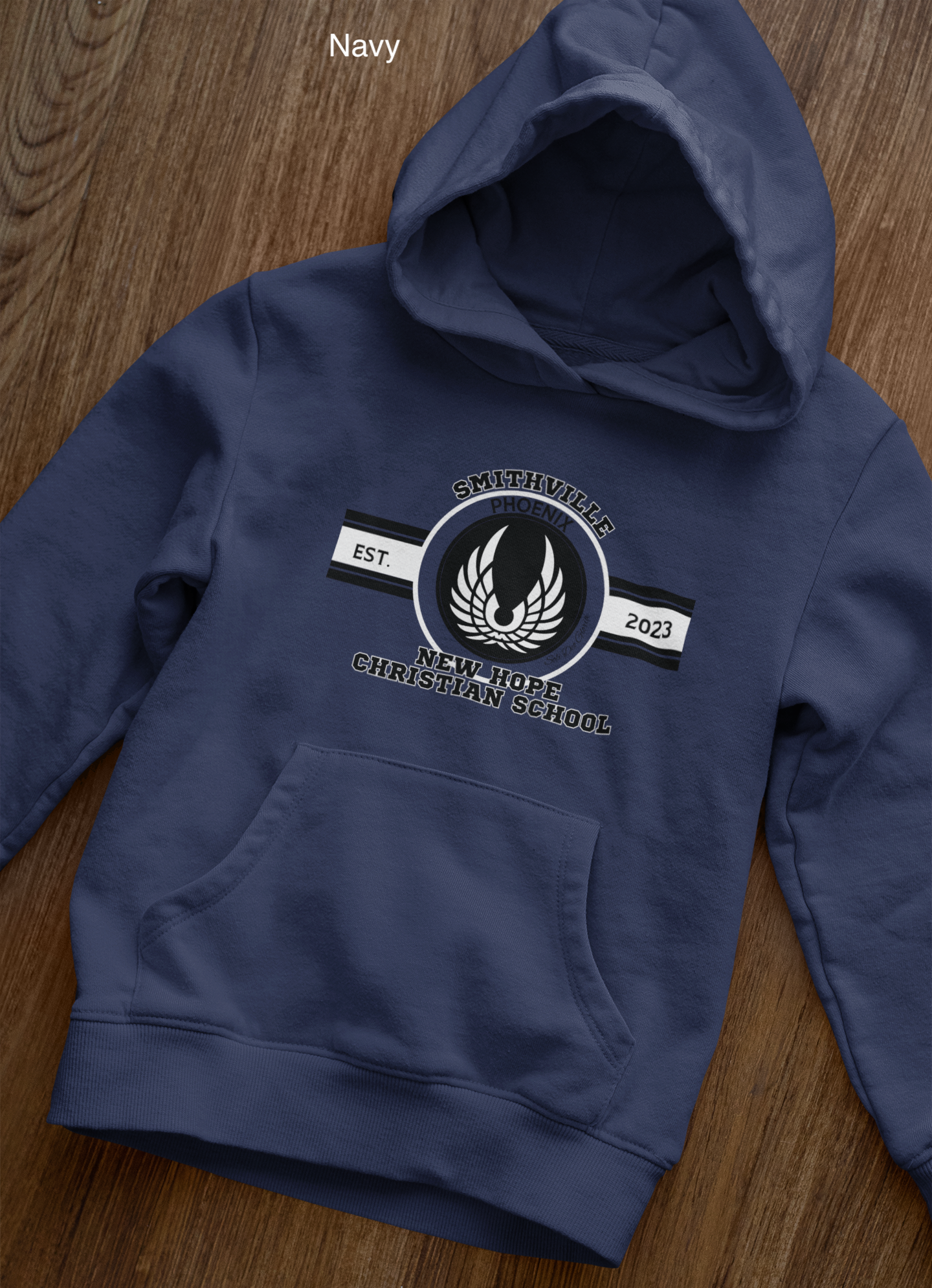 front-view-mockup-of-a-pullover-hoodie-laid-over-a-wooden-surface-33871 copy 30.png