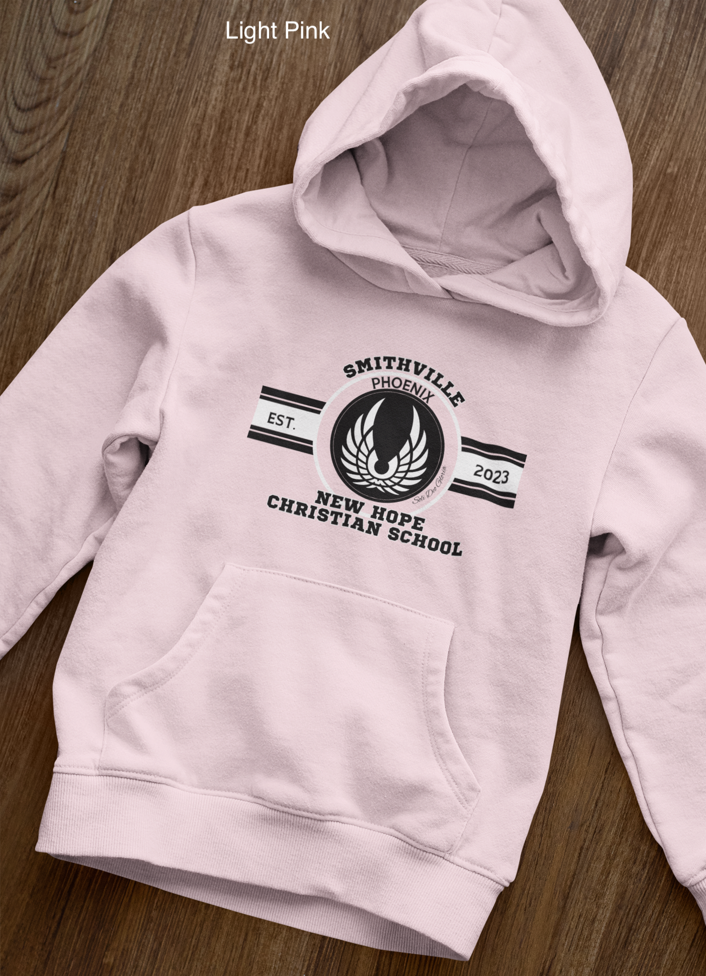 front-view-mockup-of-a-pullover-hoodie-laid-over-a-wooden-surface-33871 copy 24.png
