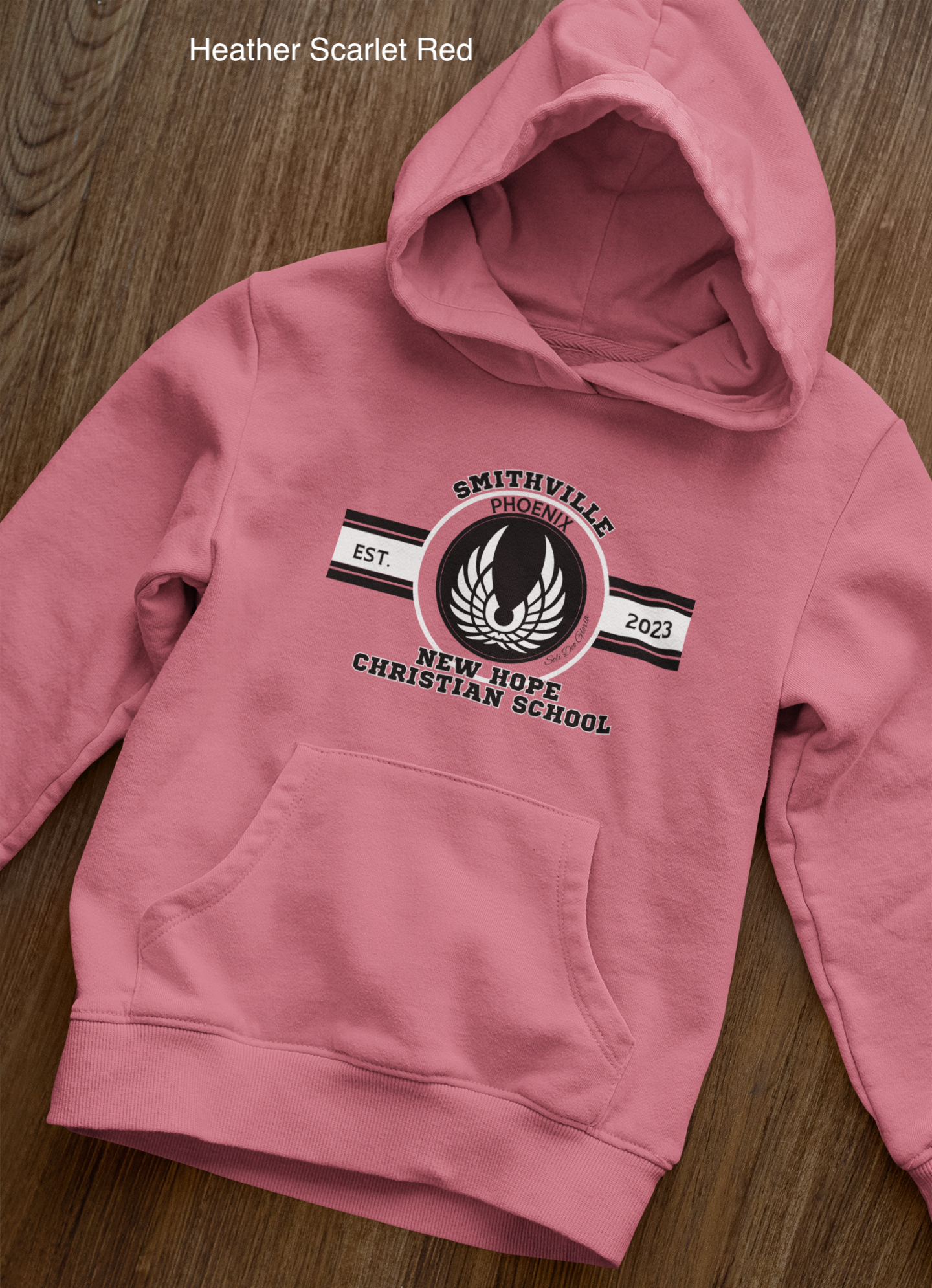 front-view-mockup-of-a-pullover-hoodie-laid-over-a-wooden-surface-33871 copy 26.png