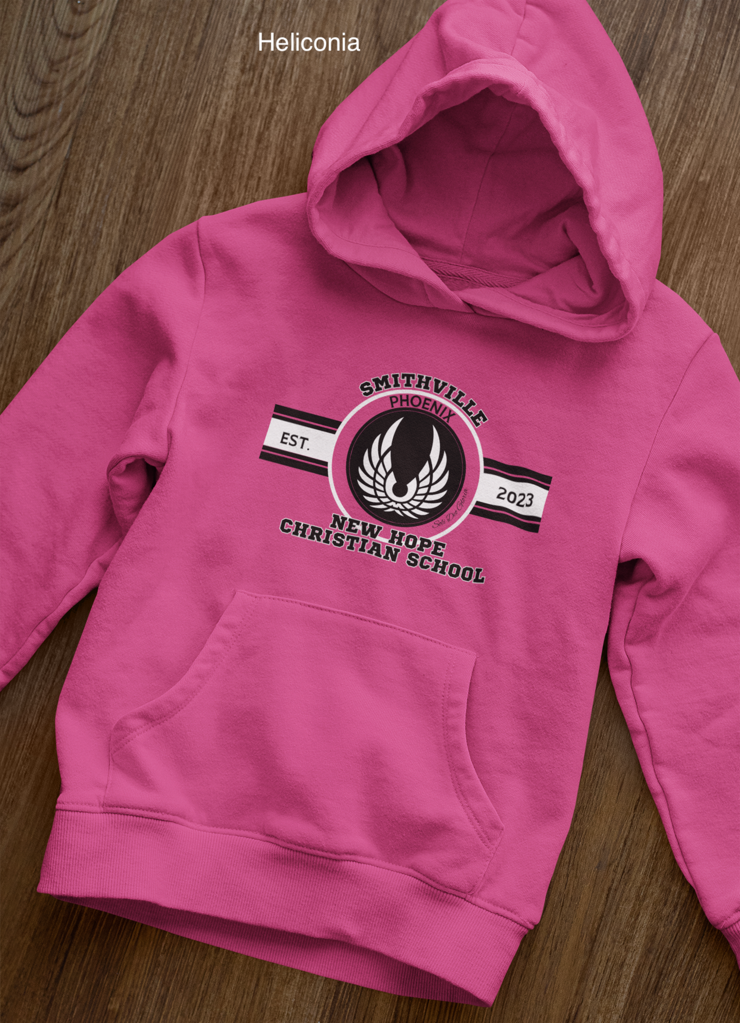 front-view-mockup-of-a-pullover-hoodie-laid-over-a-wooden-surface-33871 copy 25.png