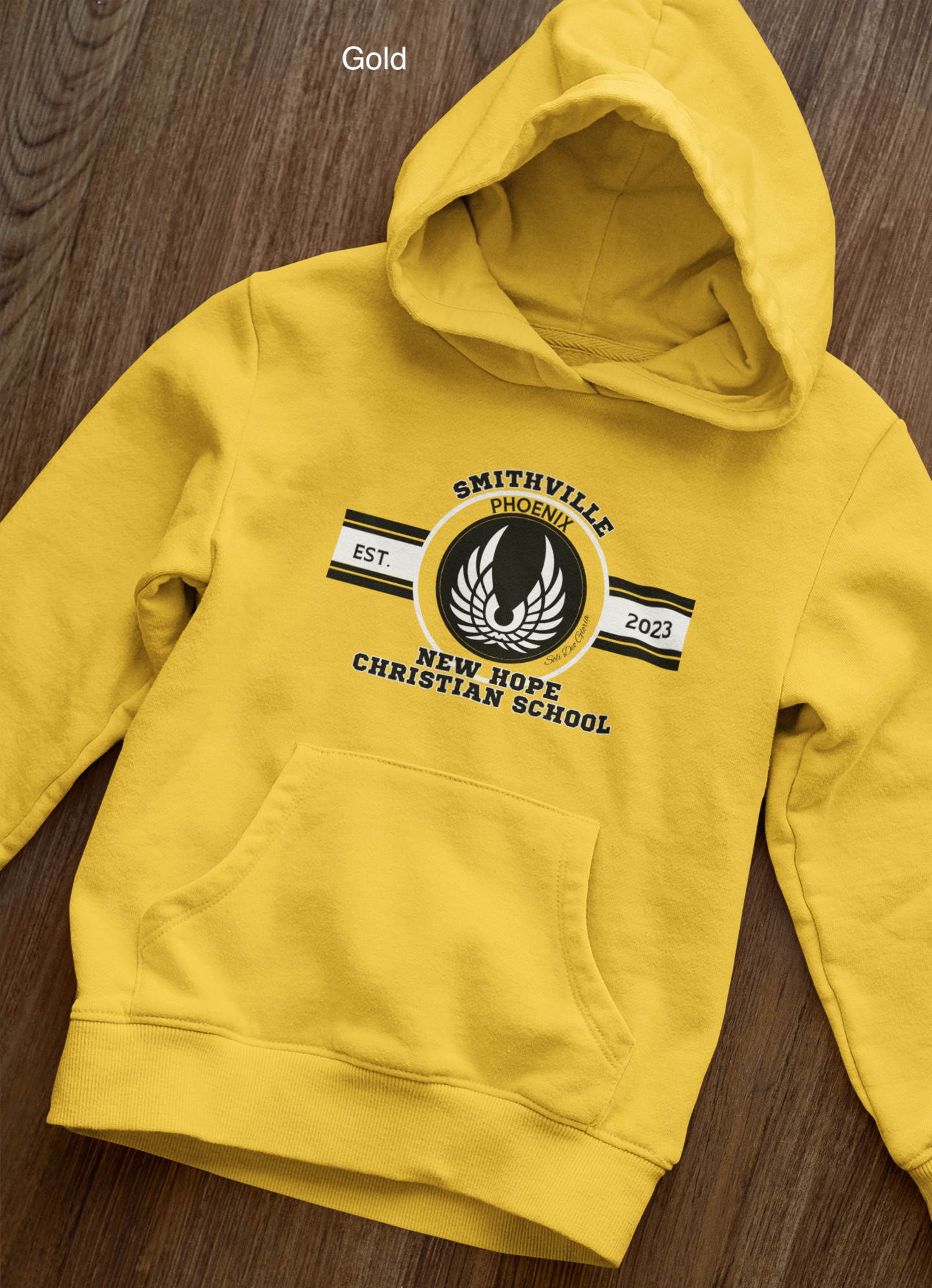 front-view-mockup-of-a-pullover-hoodie-laid-over-a-wooden-surface-33871 copy 29.png