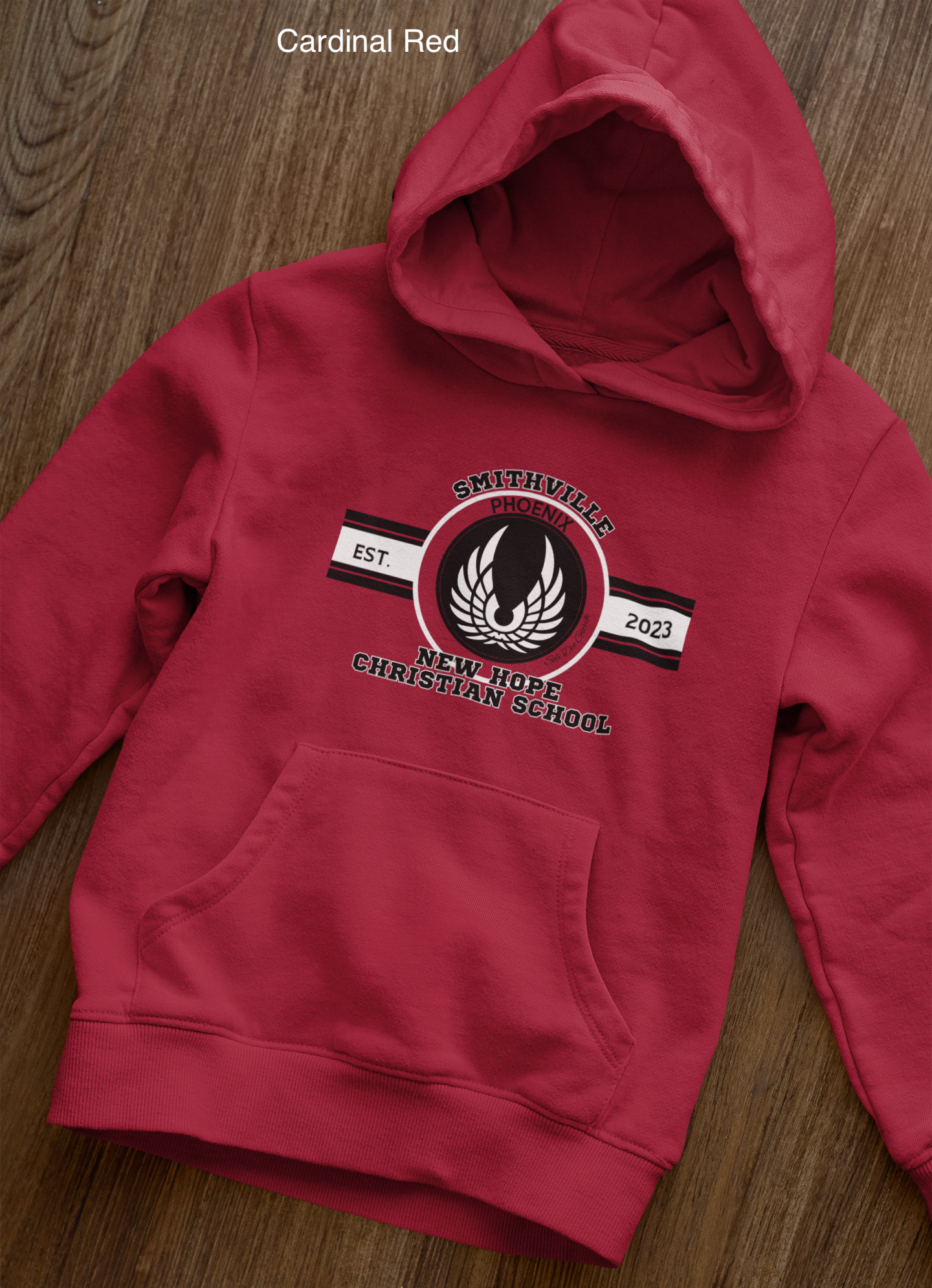 front-view-mockup-of-a-pullover-hoodie-laid-over-a-wooden-surface-33871 copy 33.png