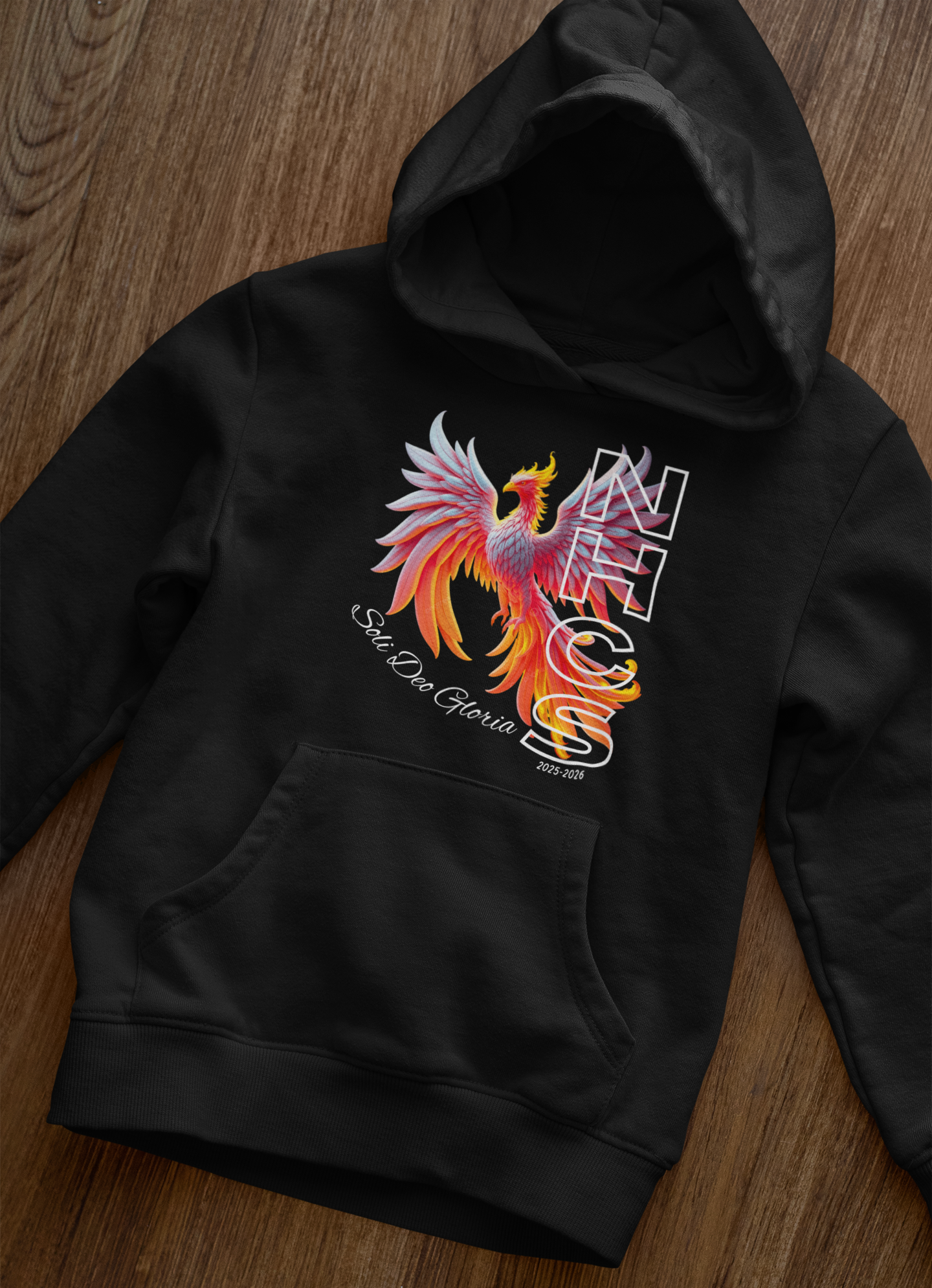 front-view-mockup-of-a-pullover-hoodie-laid-over-a-wooden-surface-33871 copy.png