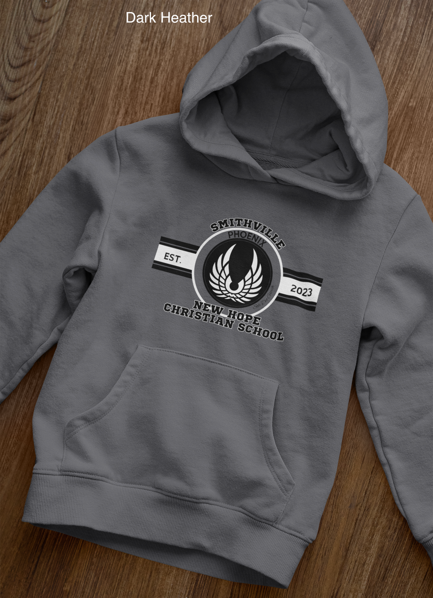 front-view-mockup-of-a-pullover-hoodie-laid-over-a-wooden-surface-33871 copy 32.png