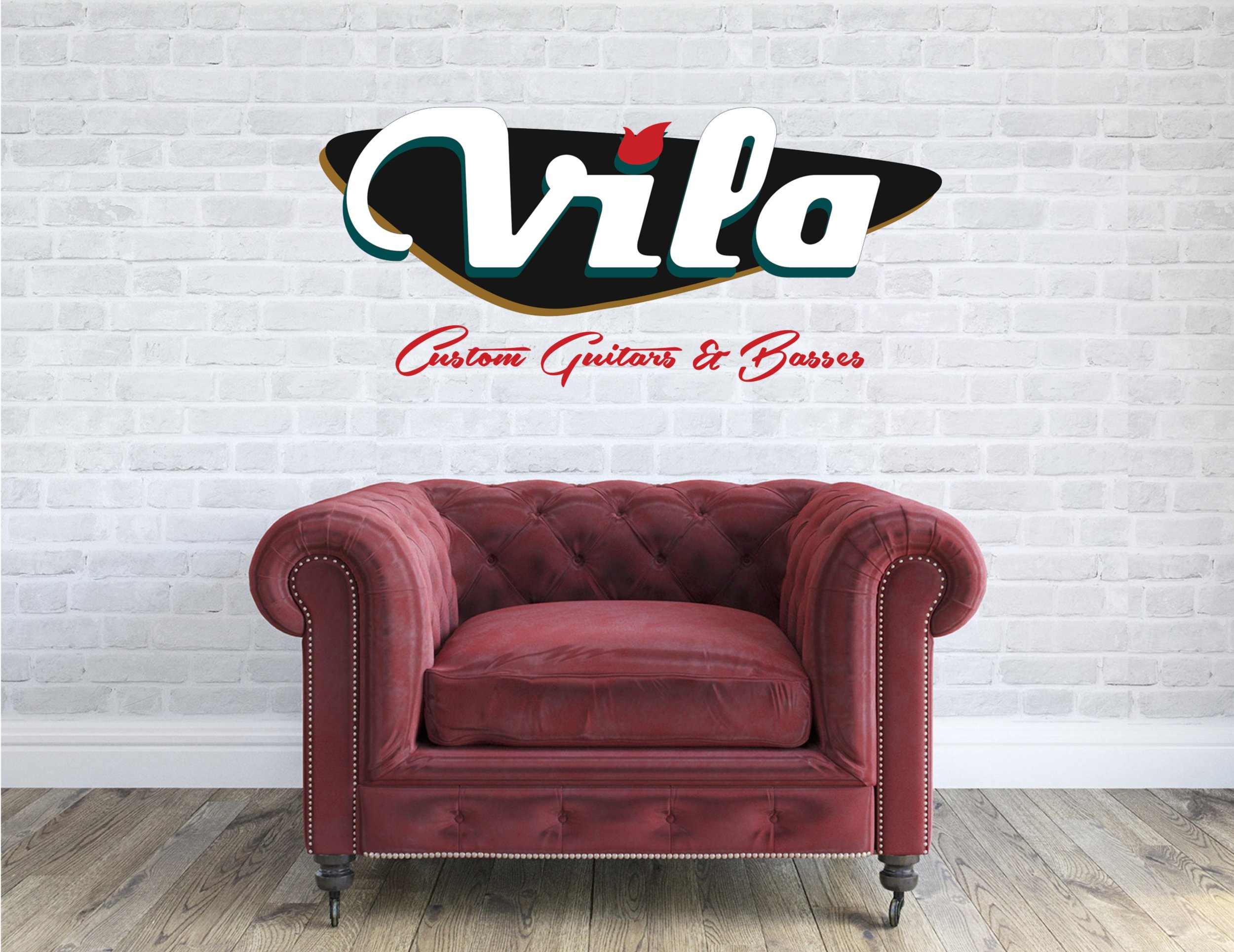 Red velvet tufted couch against a white brick wall with "Vila Custom Guitars & Basses" logo above it.