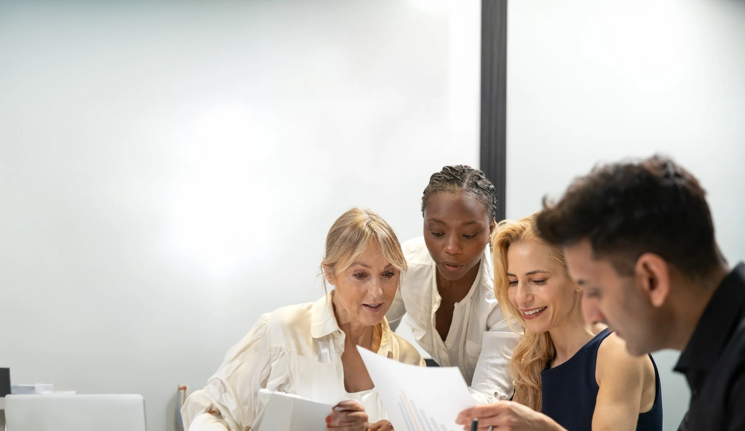 medium-shot-people-discussing-business-plan+%281%29.jpg
