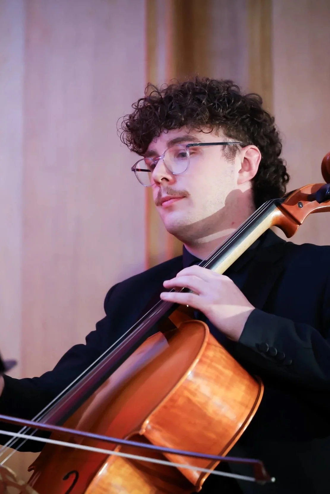 Image of Adam McCambridge playing the Cello