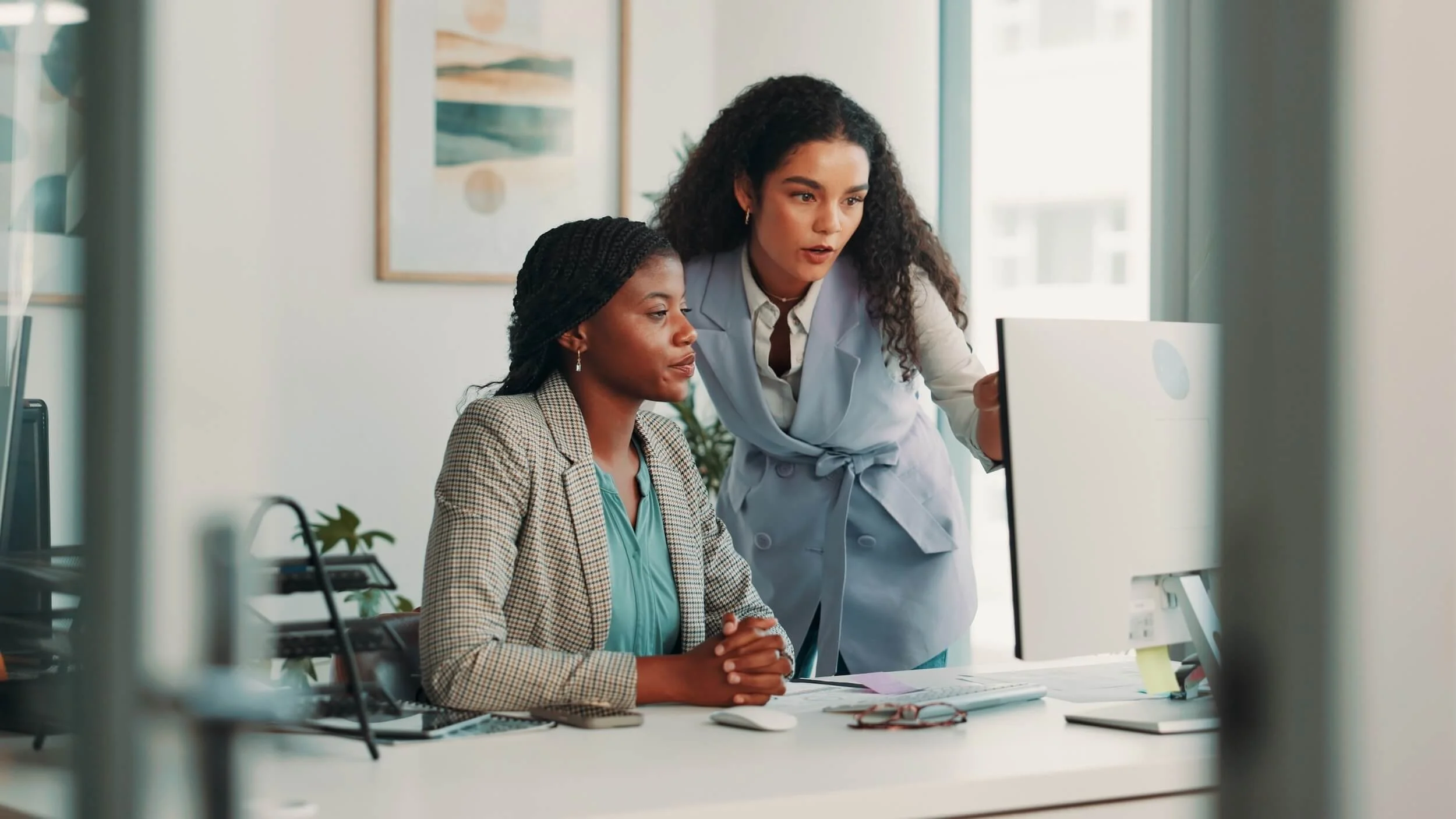 Business Workers Setting Up AI Security Controls
