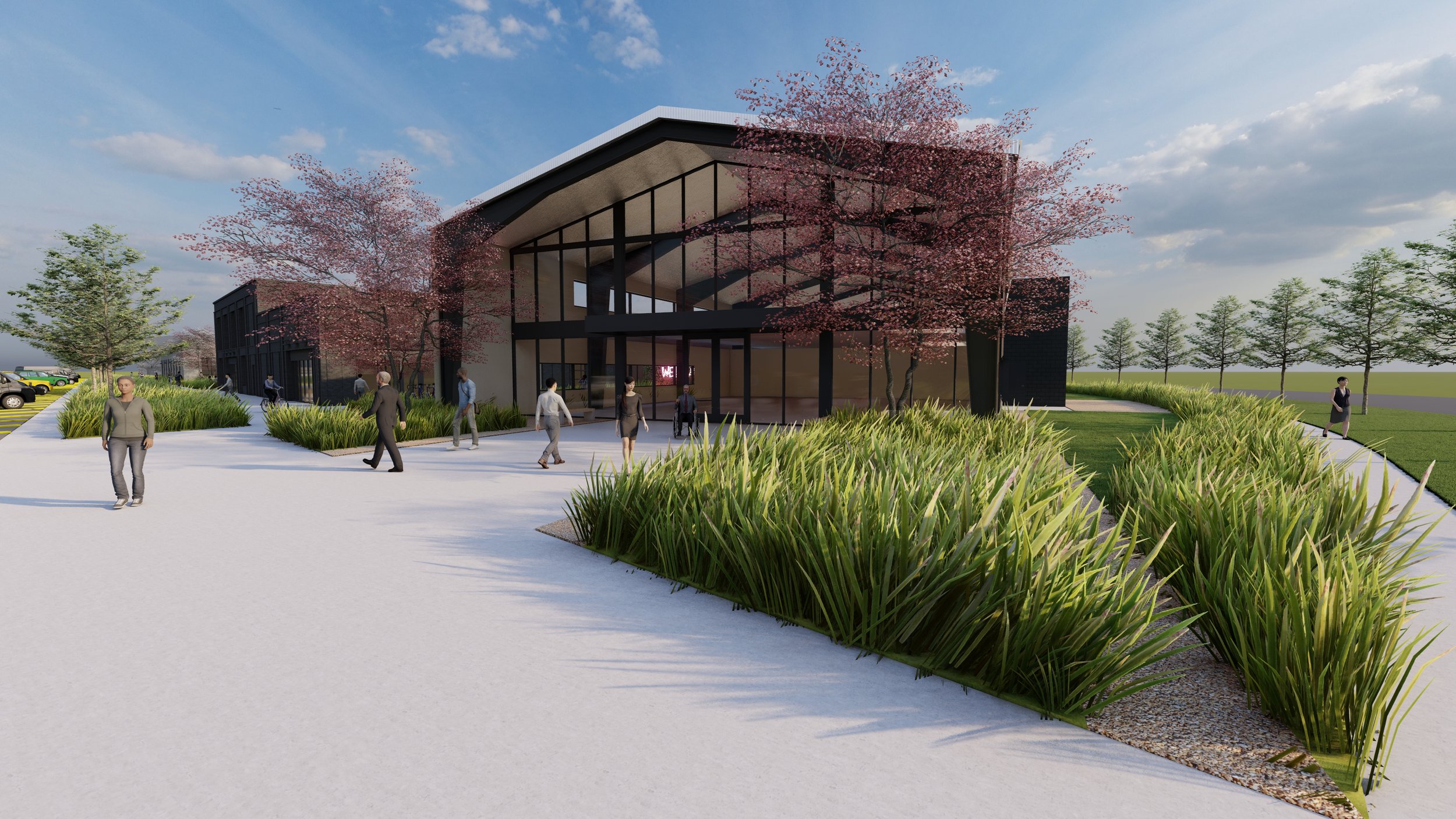Modern building with glass facade, surrounded by trees and landscaping, outdoors, active, entertainment, exercise