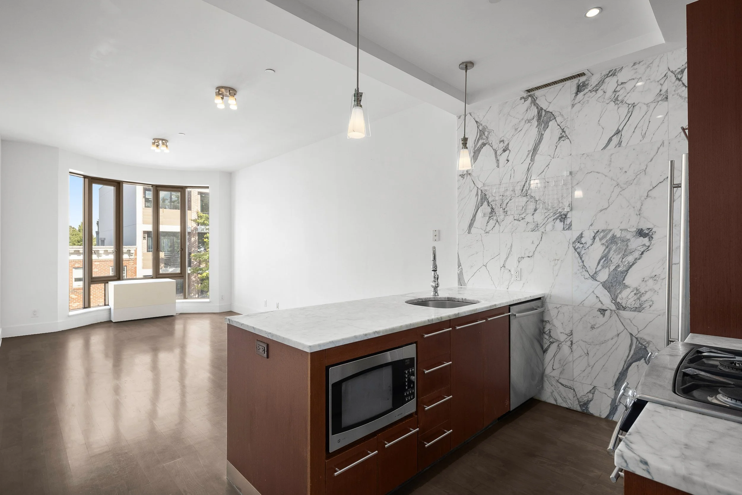 9. EMPTY Living Dining Kitchen.jpg